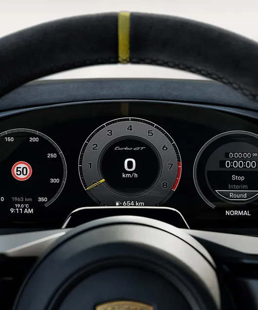 Porsche Cayenne Turbo GT interior: detailed view of the head-up display while driving on a circuit.