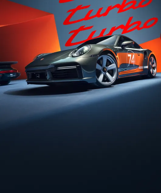 Deux Porsche 911 Turbo 50 ans avec et sans pack Heritage Design, côte à côte. 
