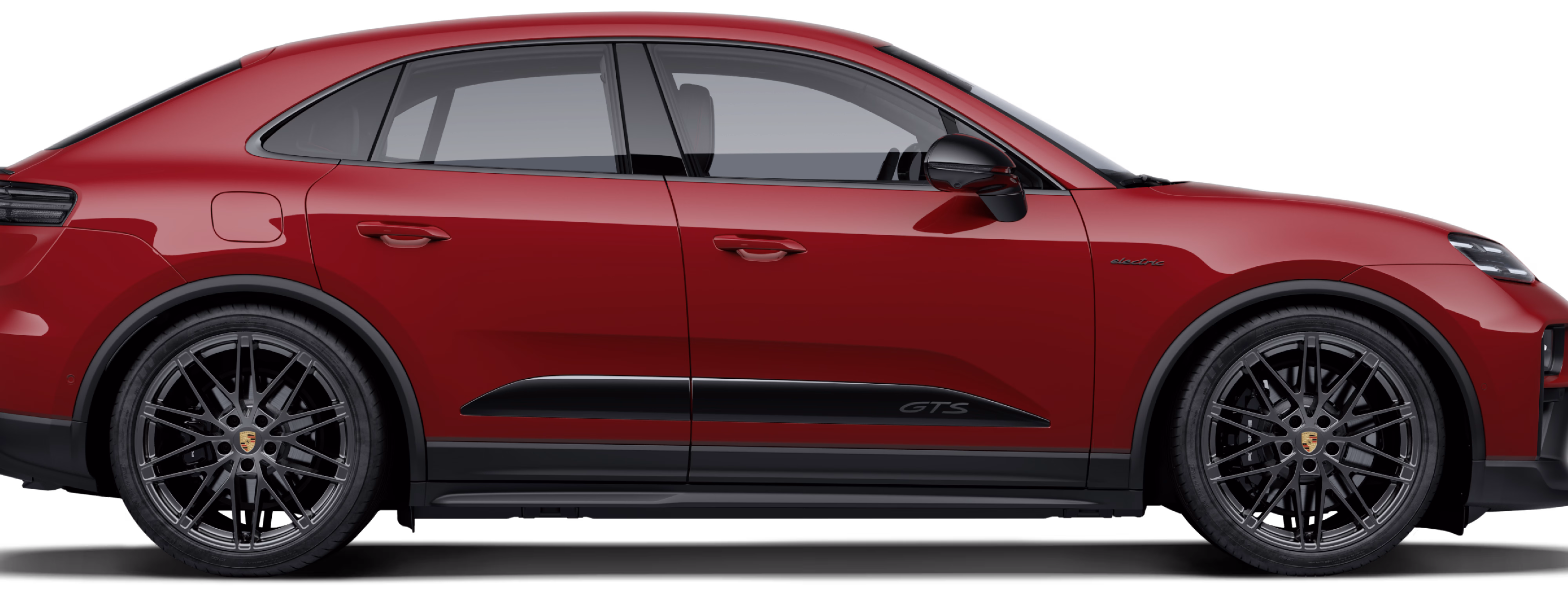 Side view or profile of the Porsche Macan GTS in Carmine Red.