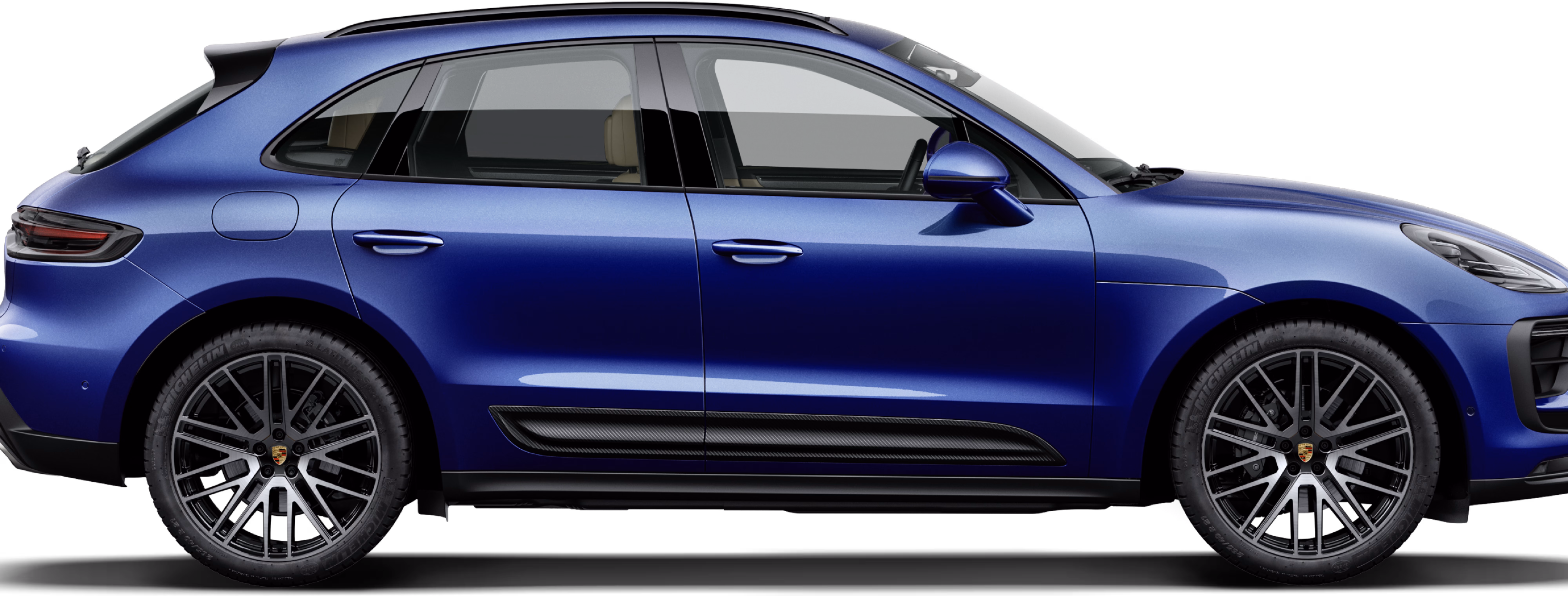 Porsche Macan in Gentian Blue Metallic. Side view.