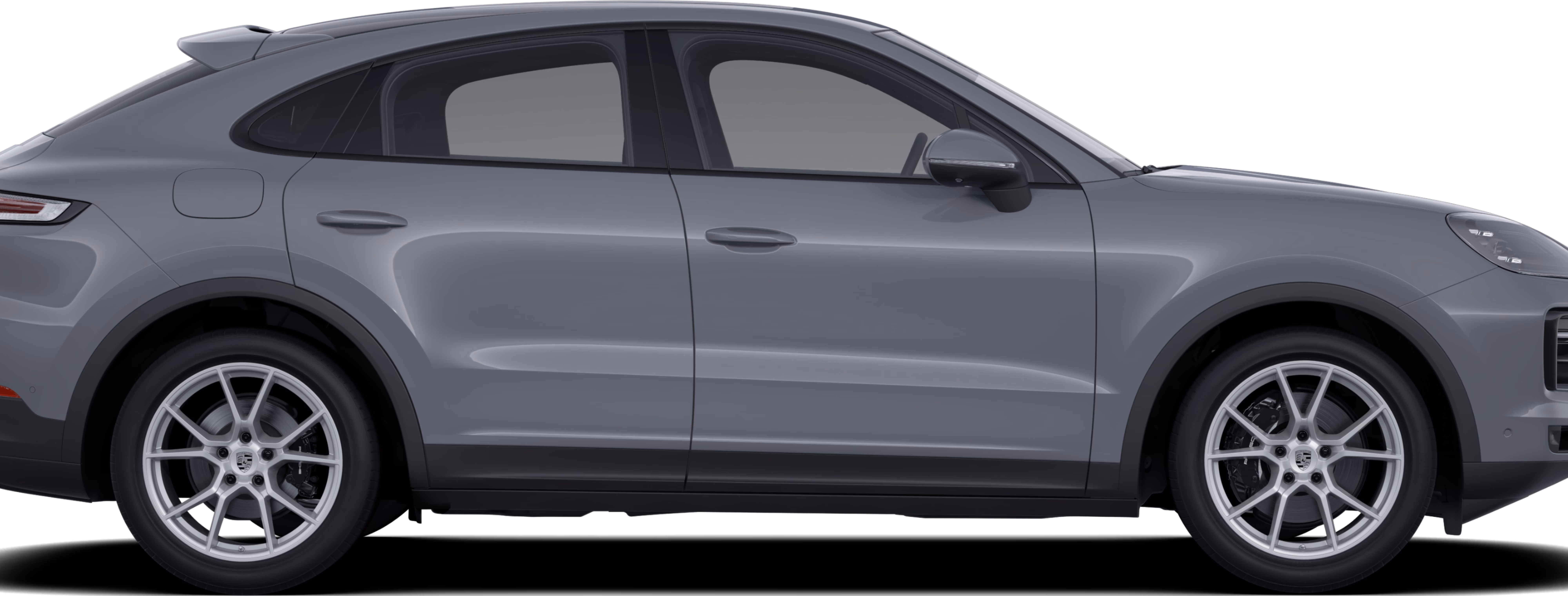 Vista lateral/perfil de un Porsche Cayenne Coupé en color Gris Arctic.