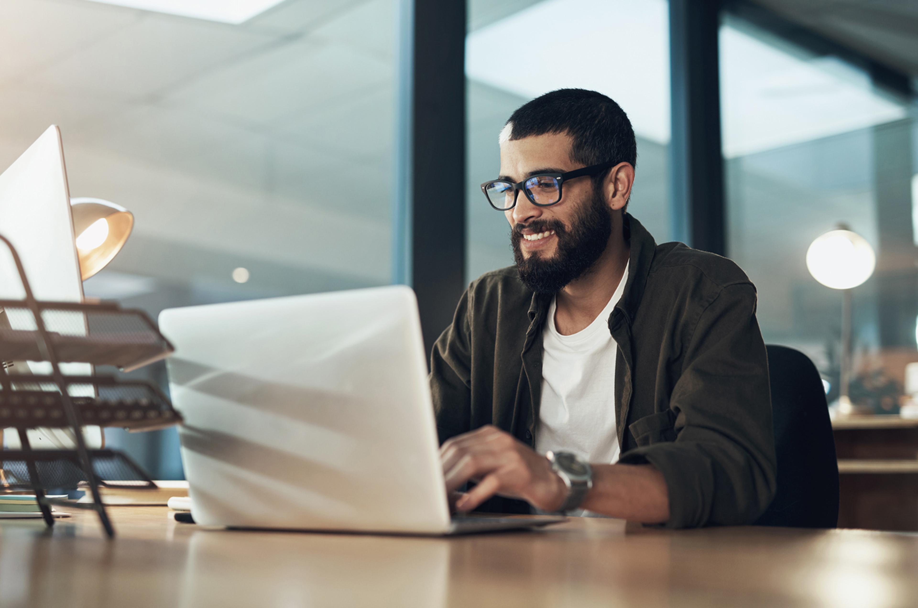 Man on laptop in office image