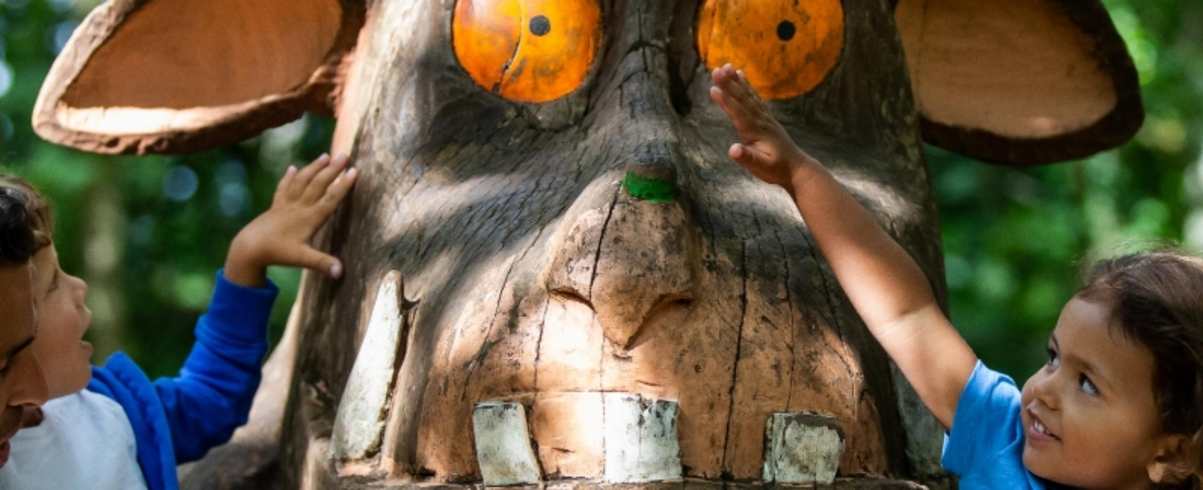 large, carved wooden sculpture of the Gruffalo