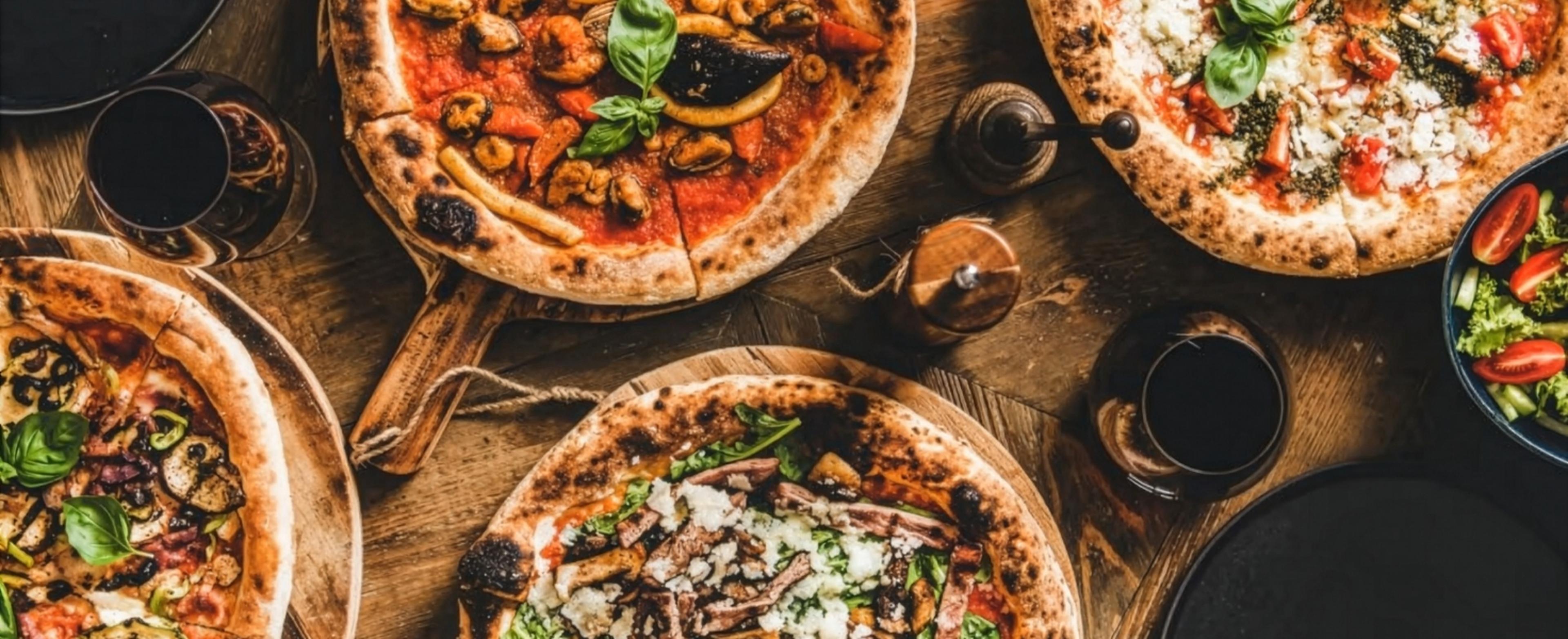 Selection of pizzas on a table
