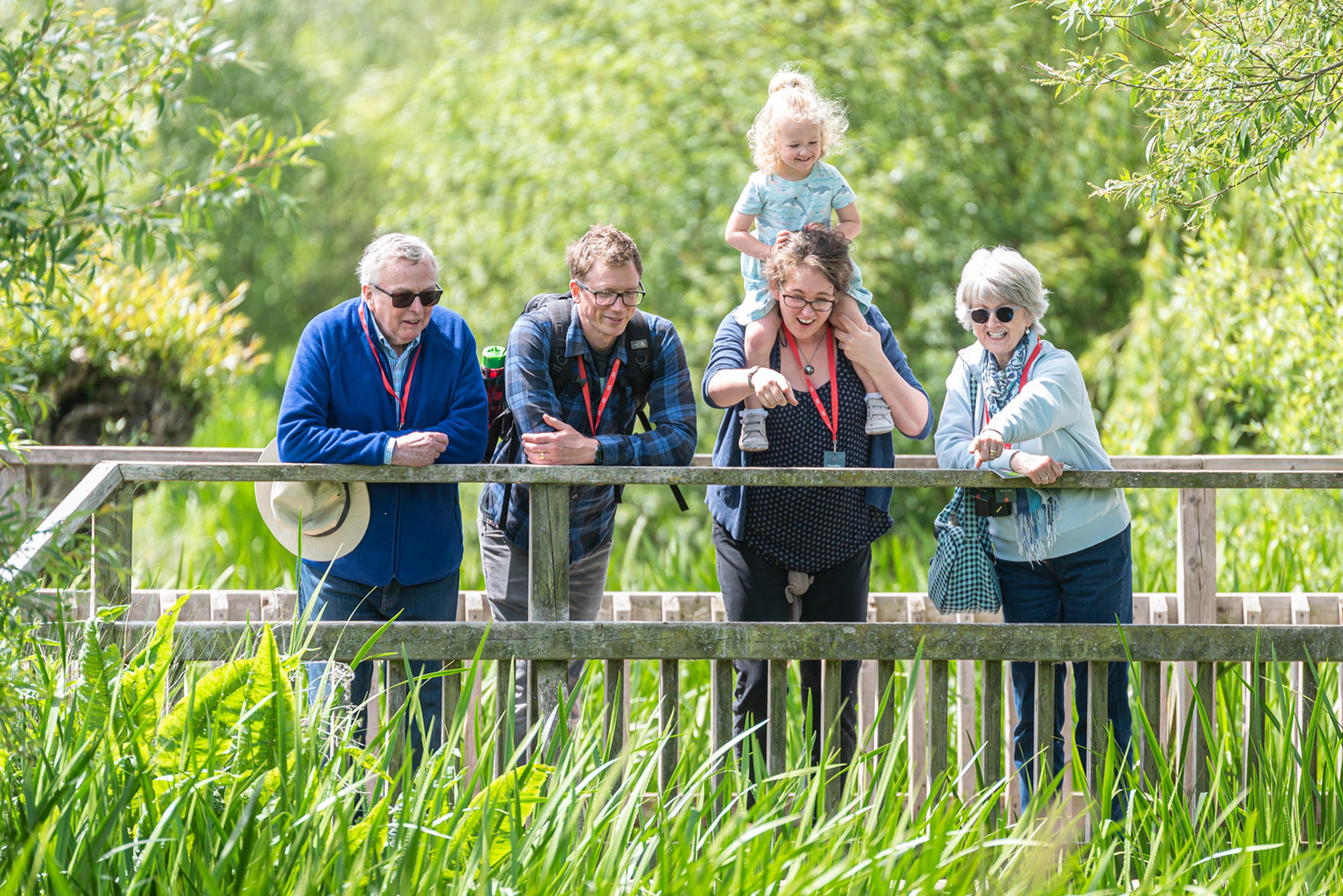 multi generational family on bridge at WWT