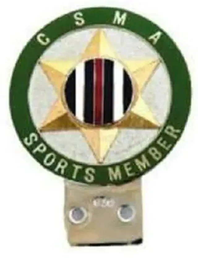 A badge with a gold star and red, black, and white stripes, surrounded by a green circle reading "CSMA Sports Member."