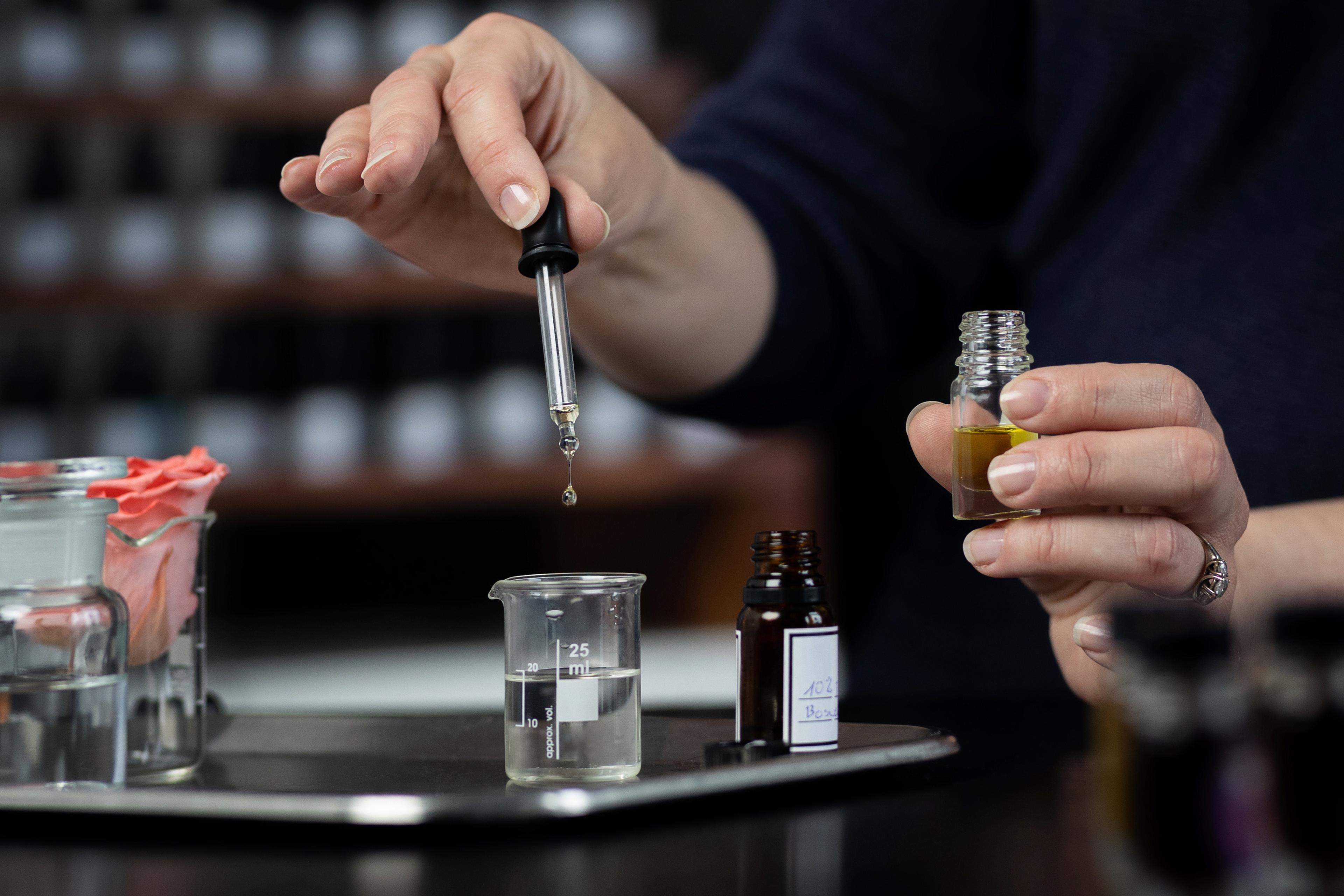 Person making a perfume
