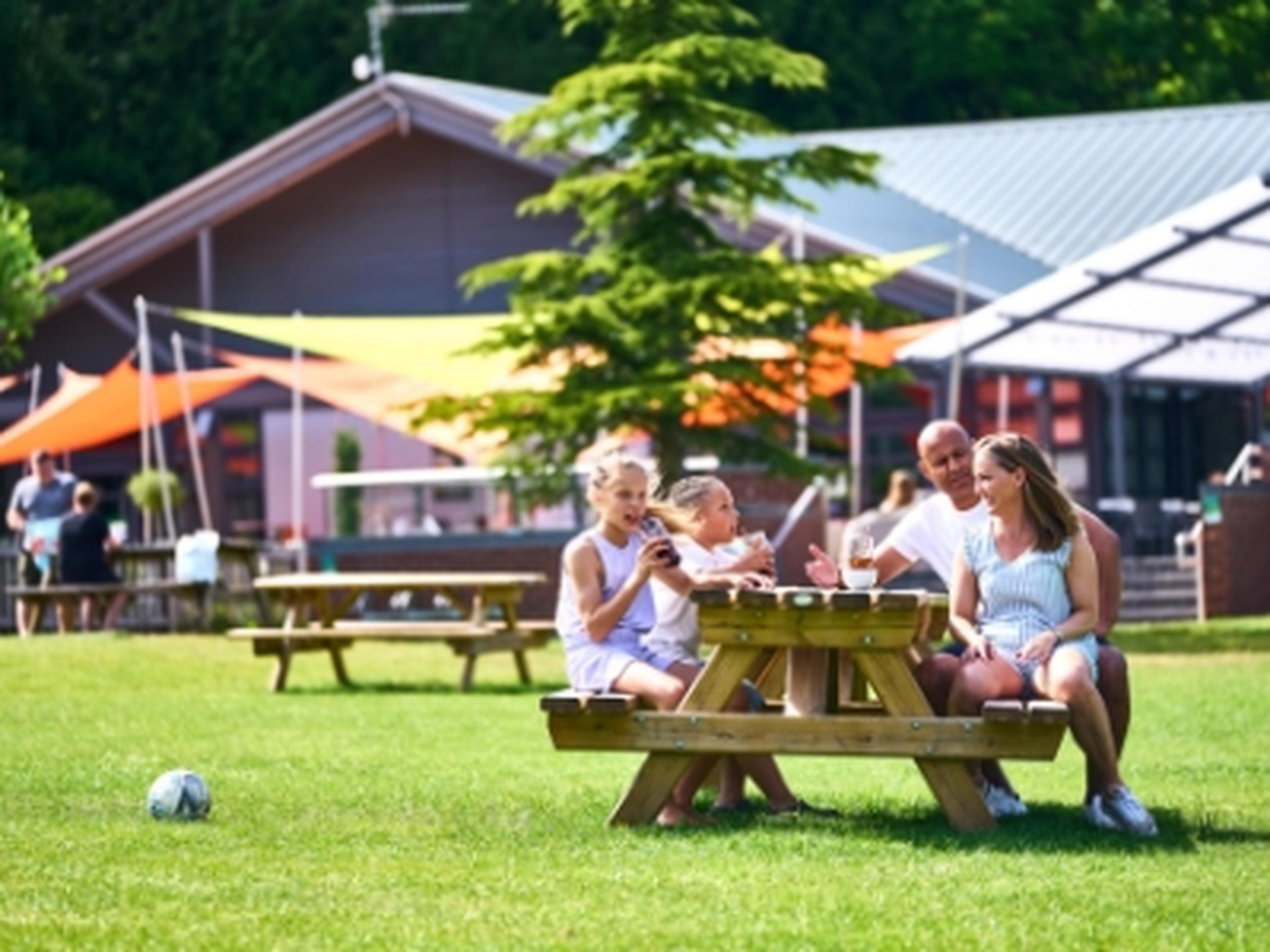 Family enjoying lunch at Whitemead Forest Park
