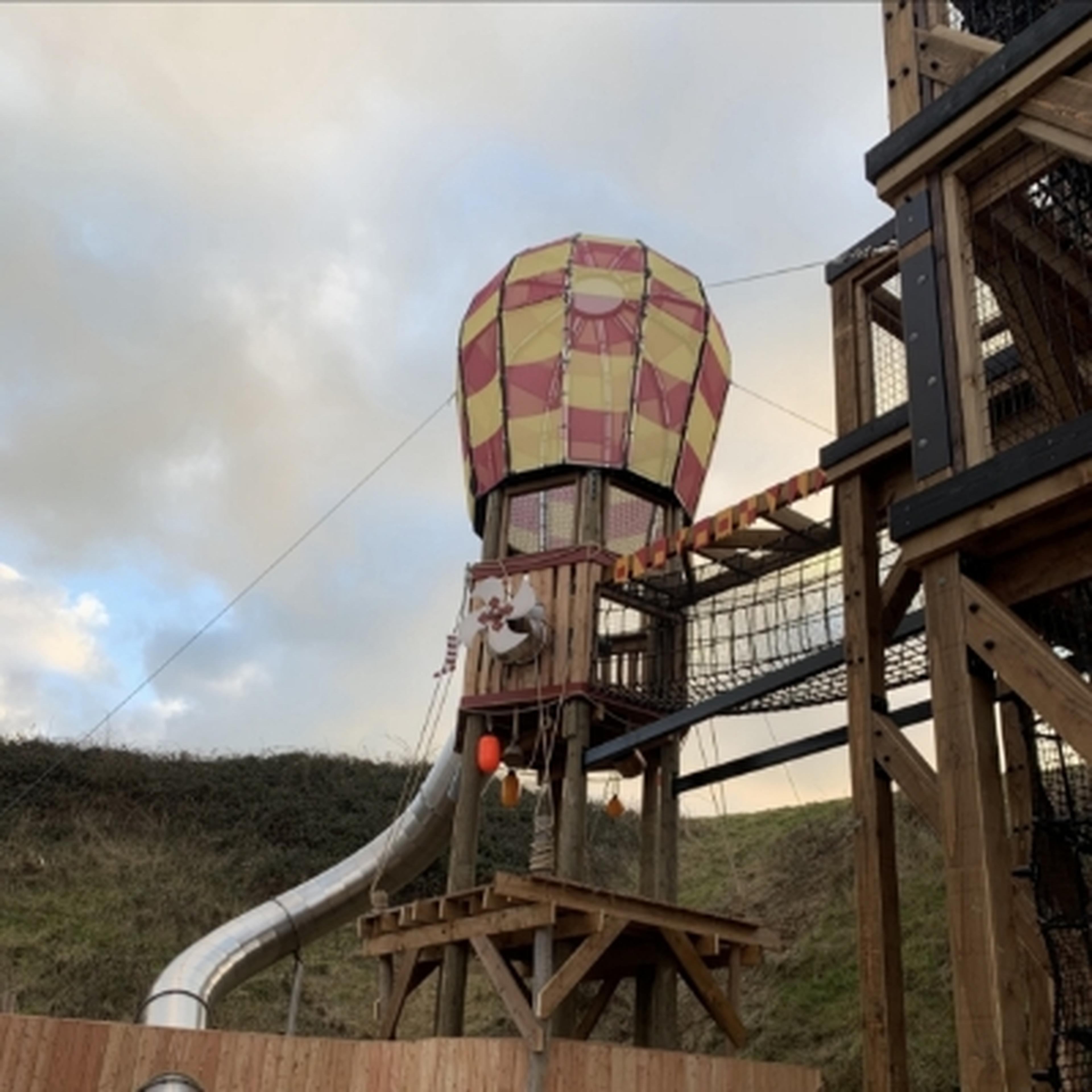 whimsical dirigible and slide