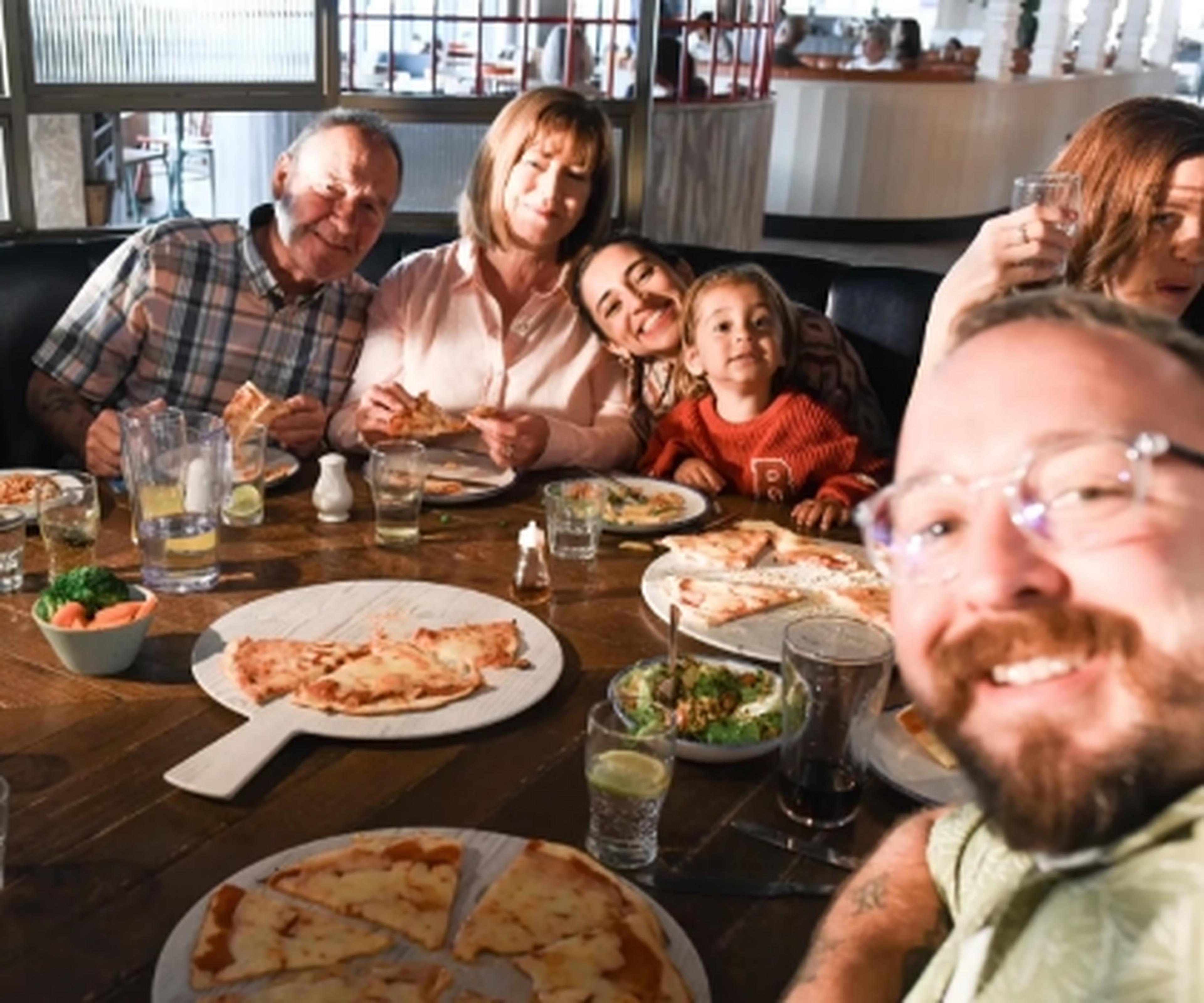 Family eating a meal in the pub