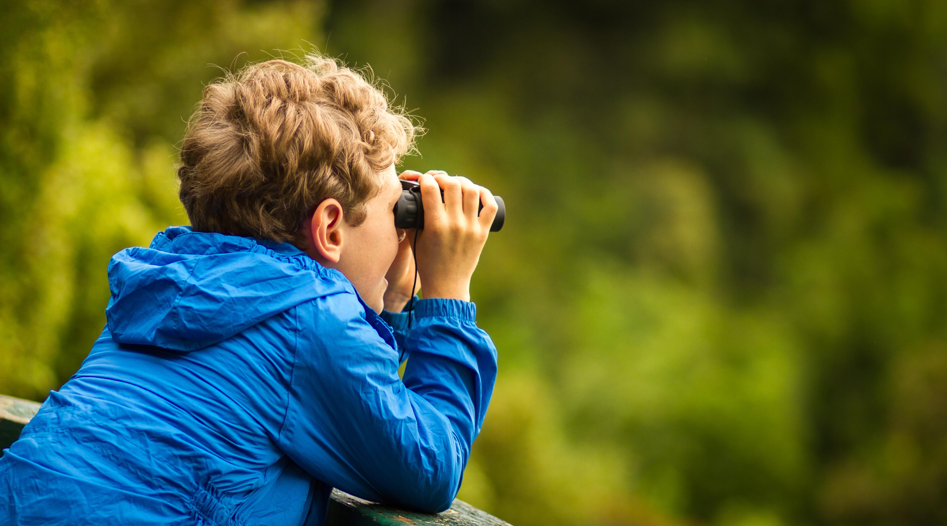 boy with binoculars