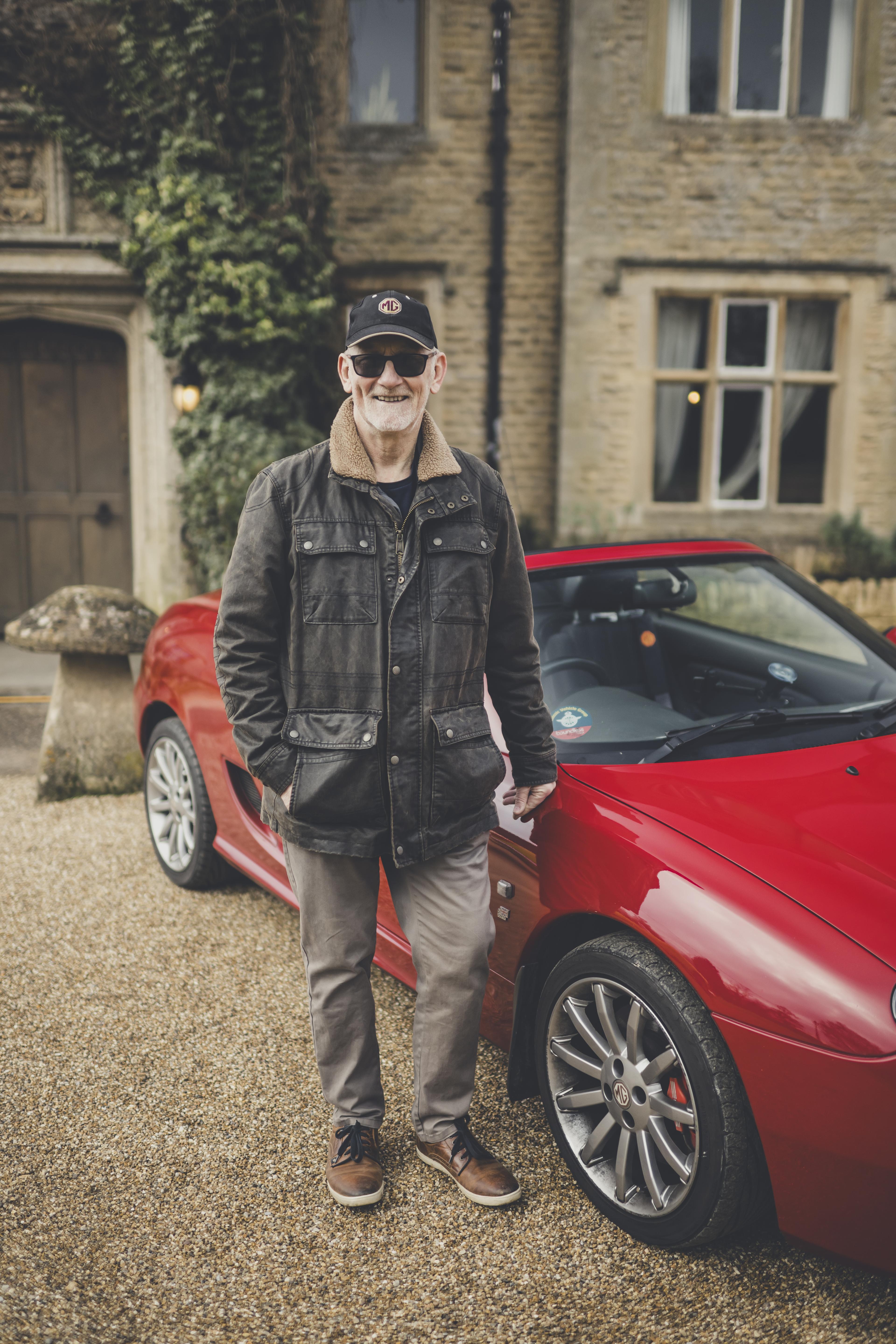 man with classic car