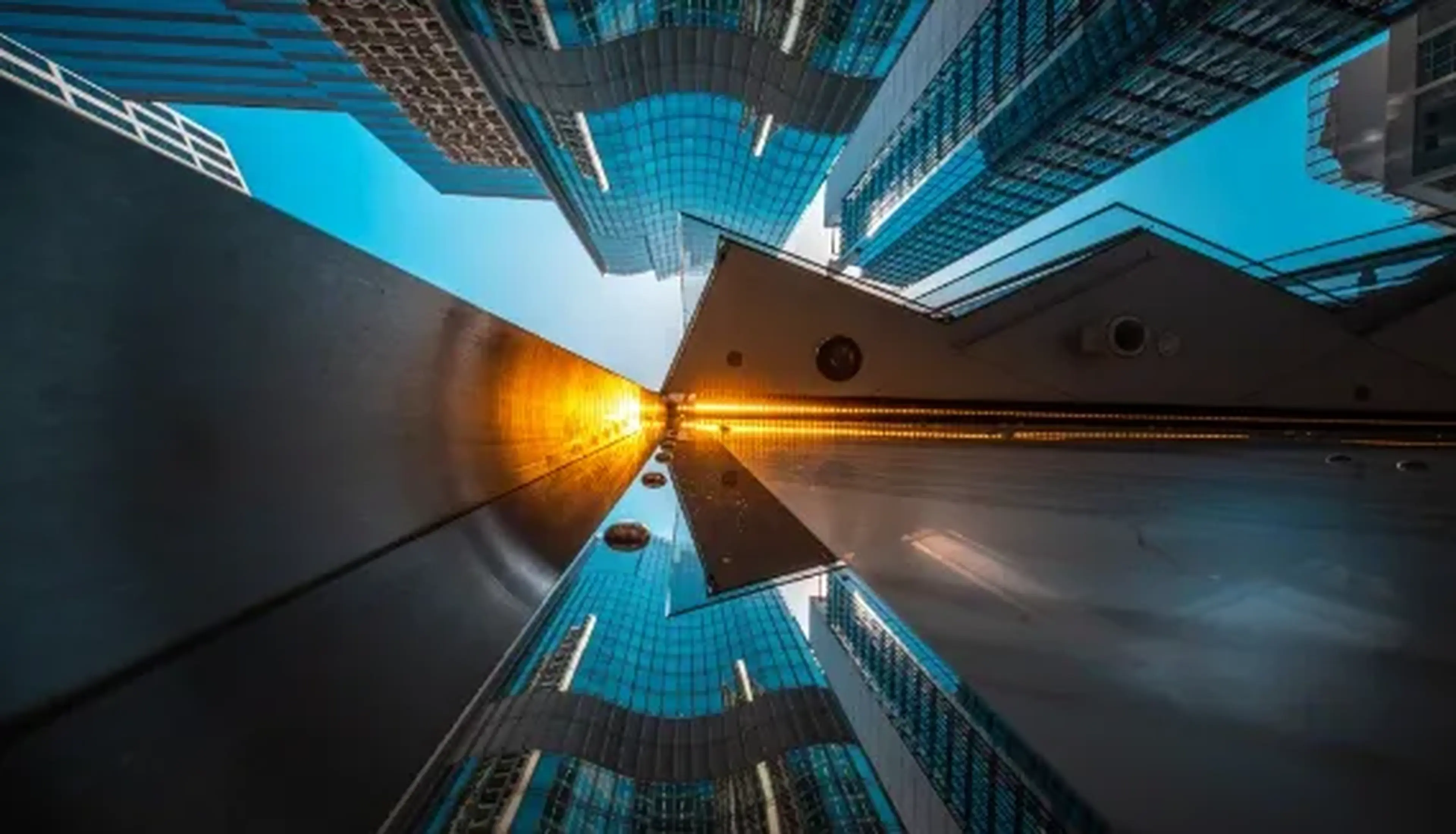 Futuristic cityscape viewed from below with skyscrapers
