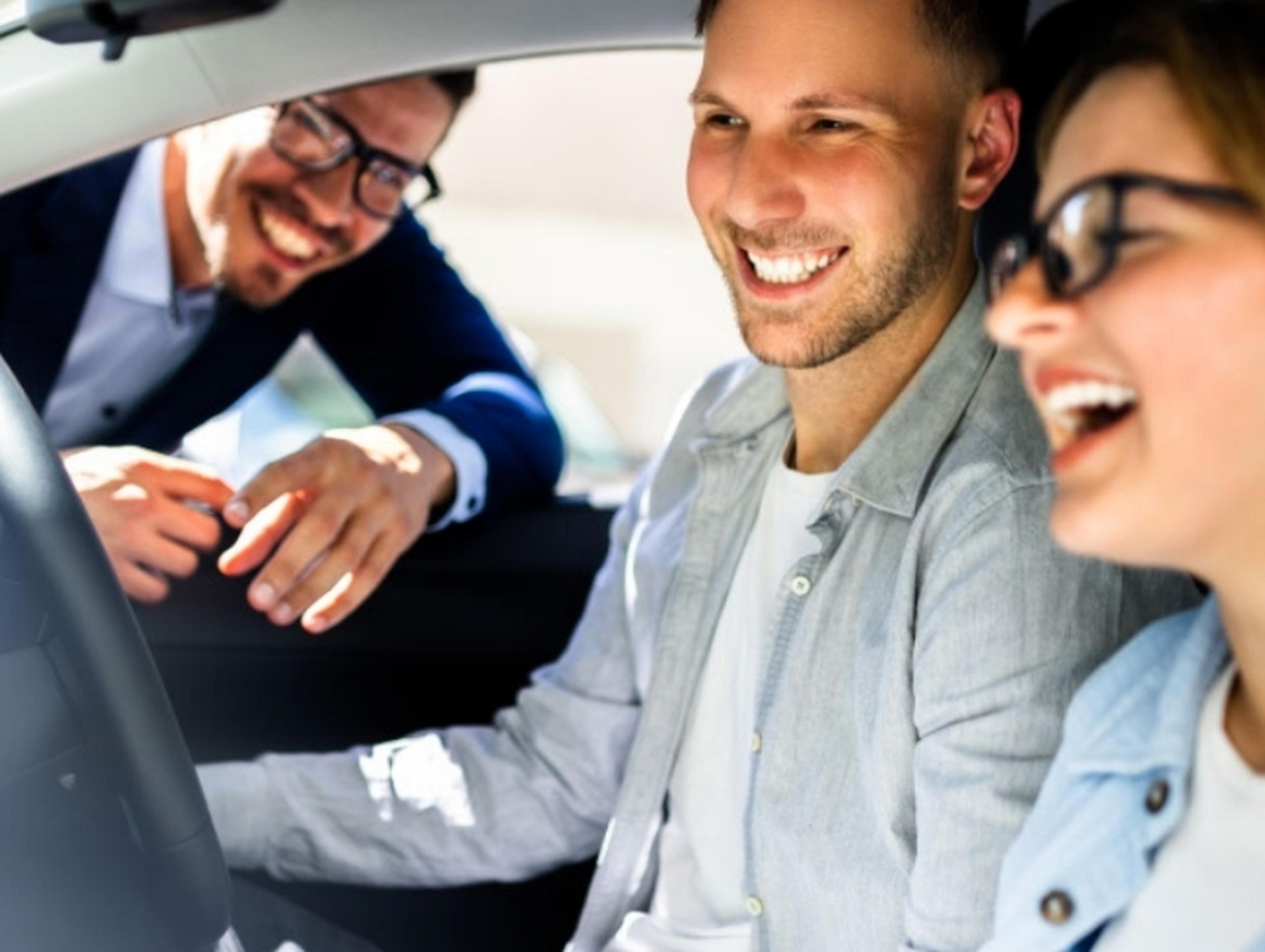 Couple purchasing a new car