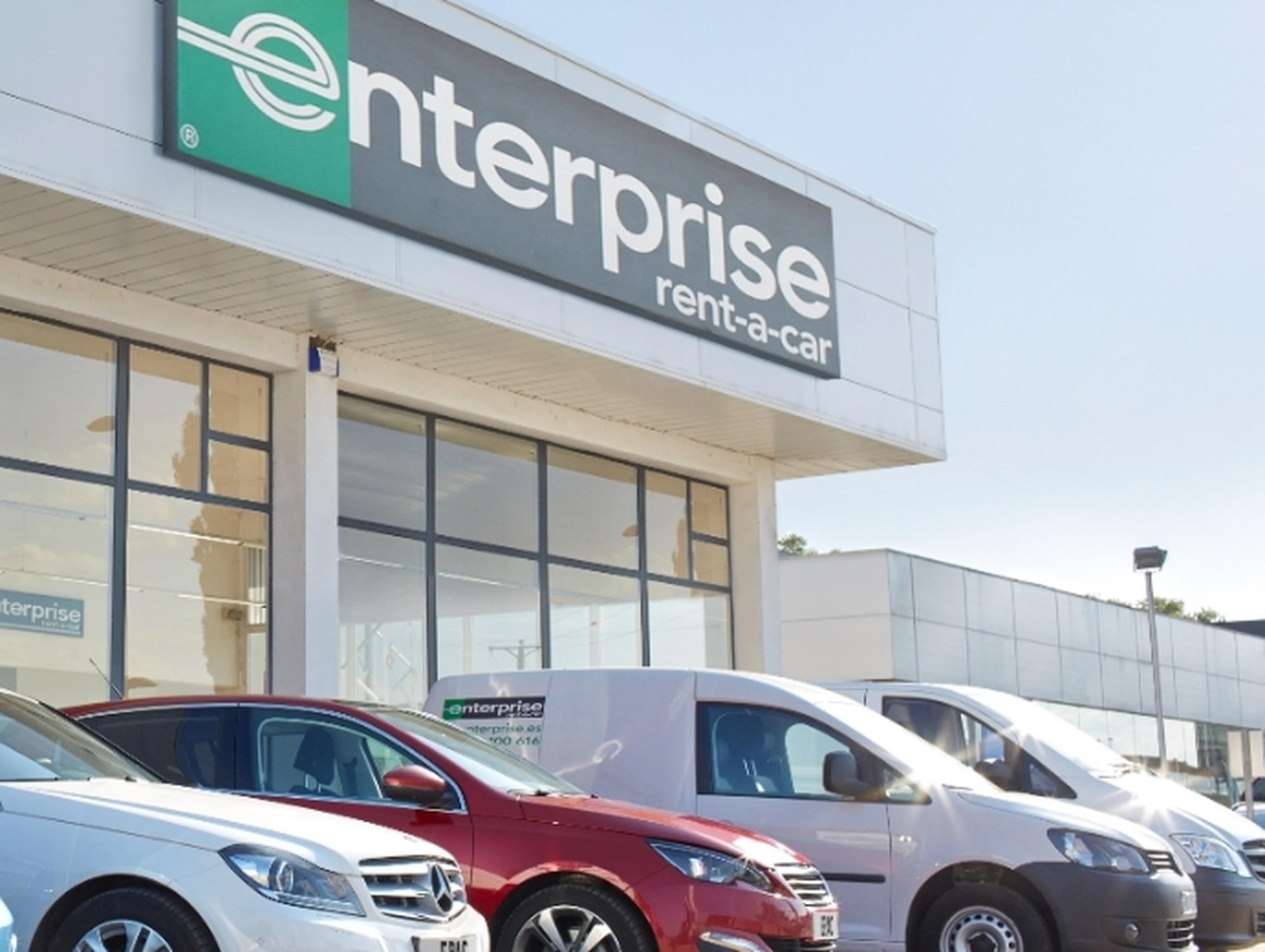 Selection of enterprise cars outside a hire centre