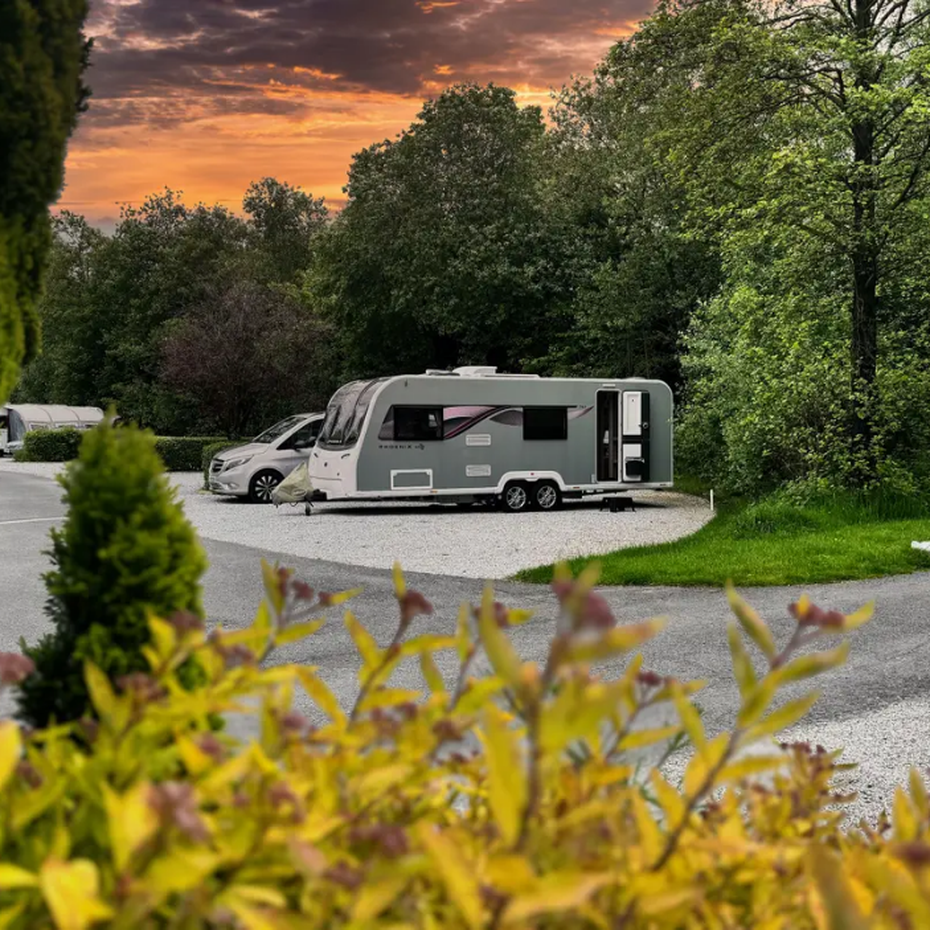 Parked touring caravan