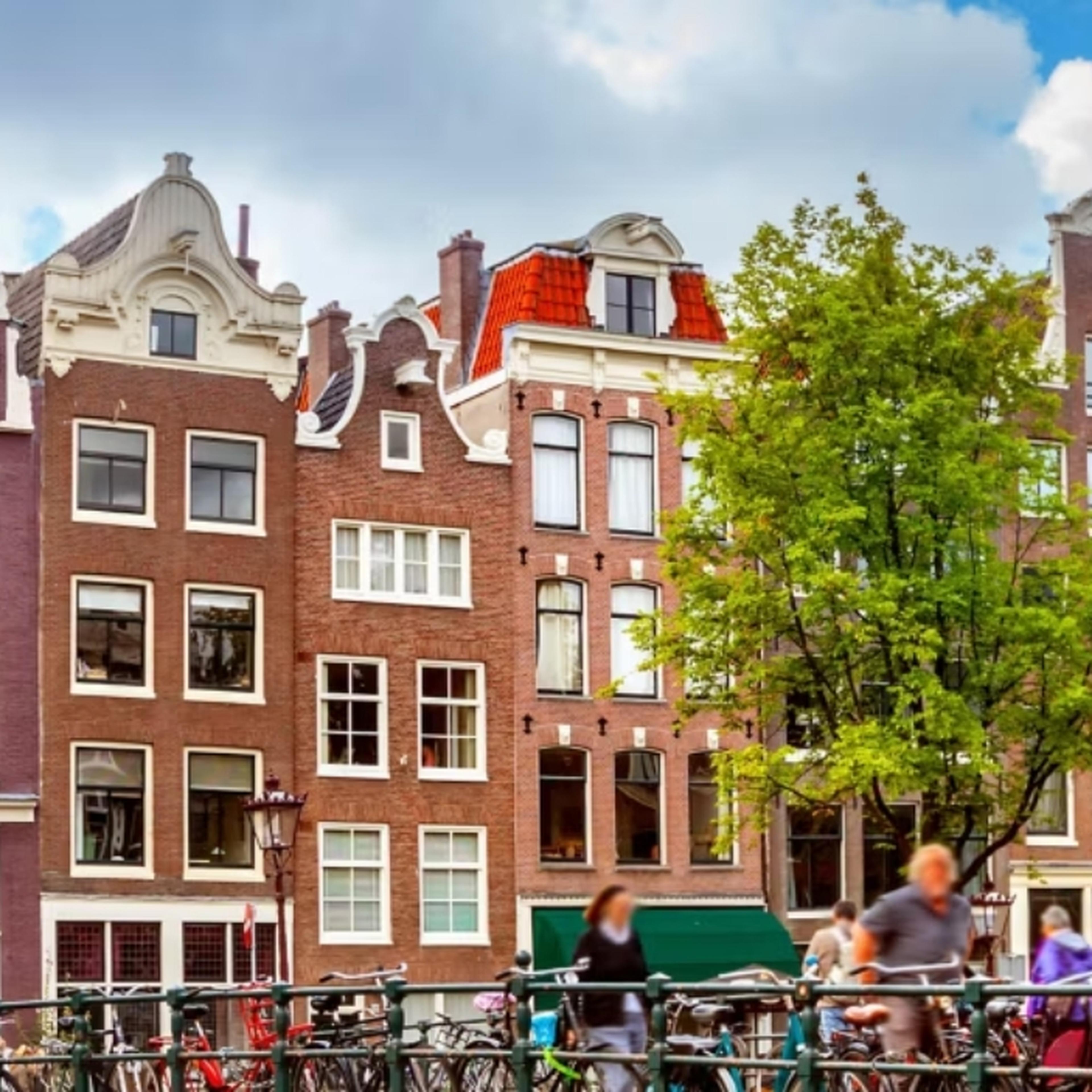 Amsterdam buildings and cyclists