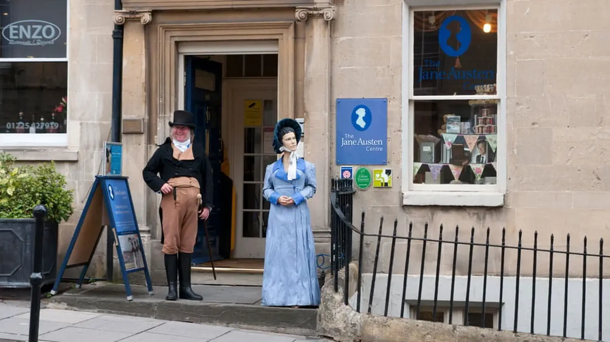 Entrance of The Jane Austen Centre with mannequins dressed in period attire outside