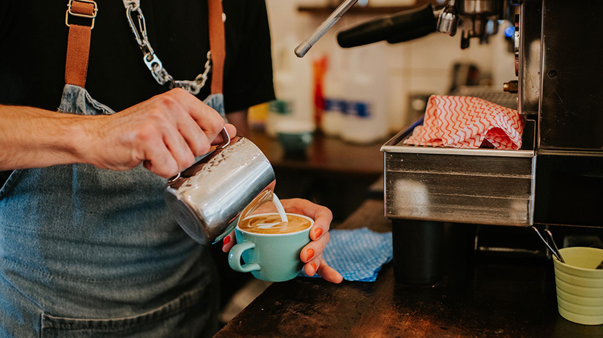 Barista making coffee