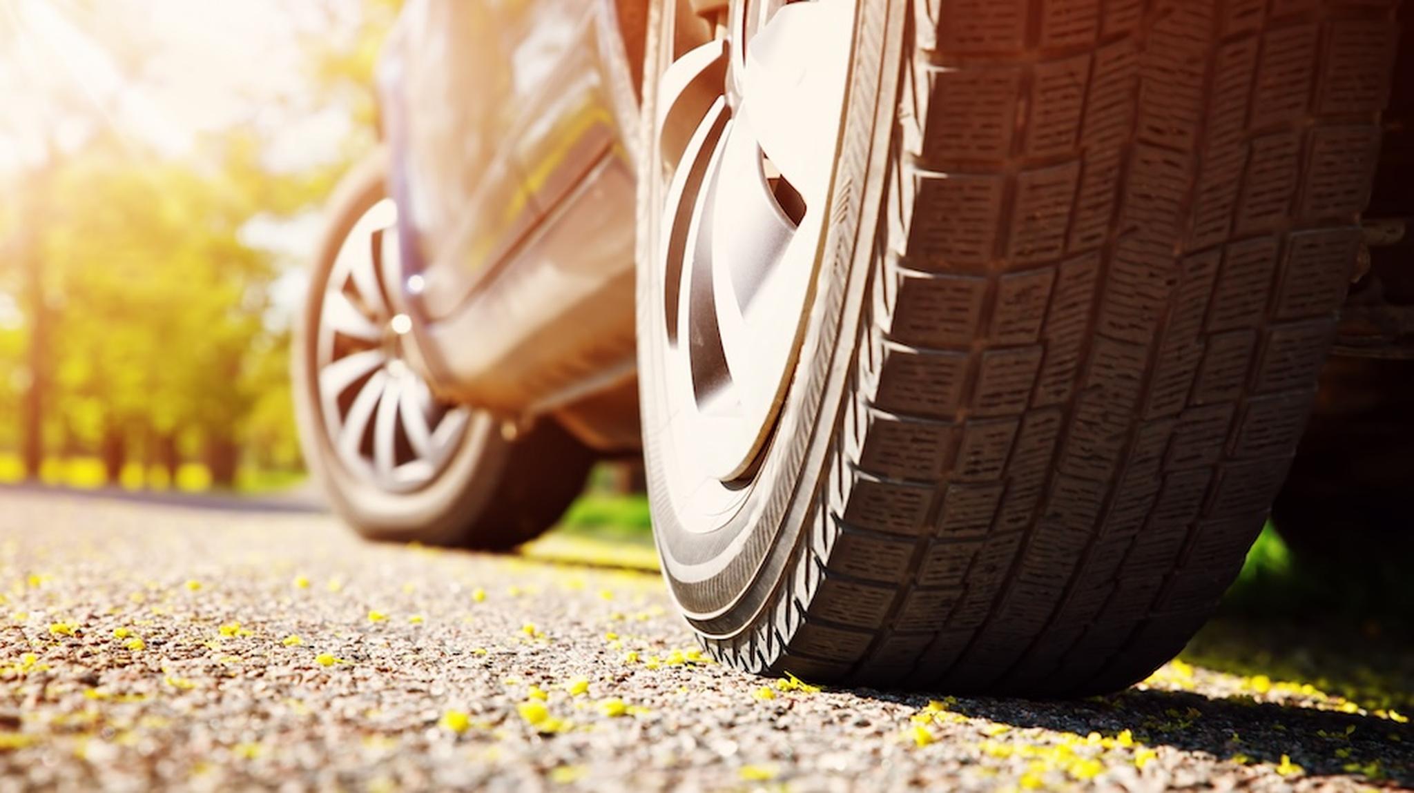 Car wheels on road