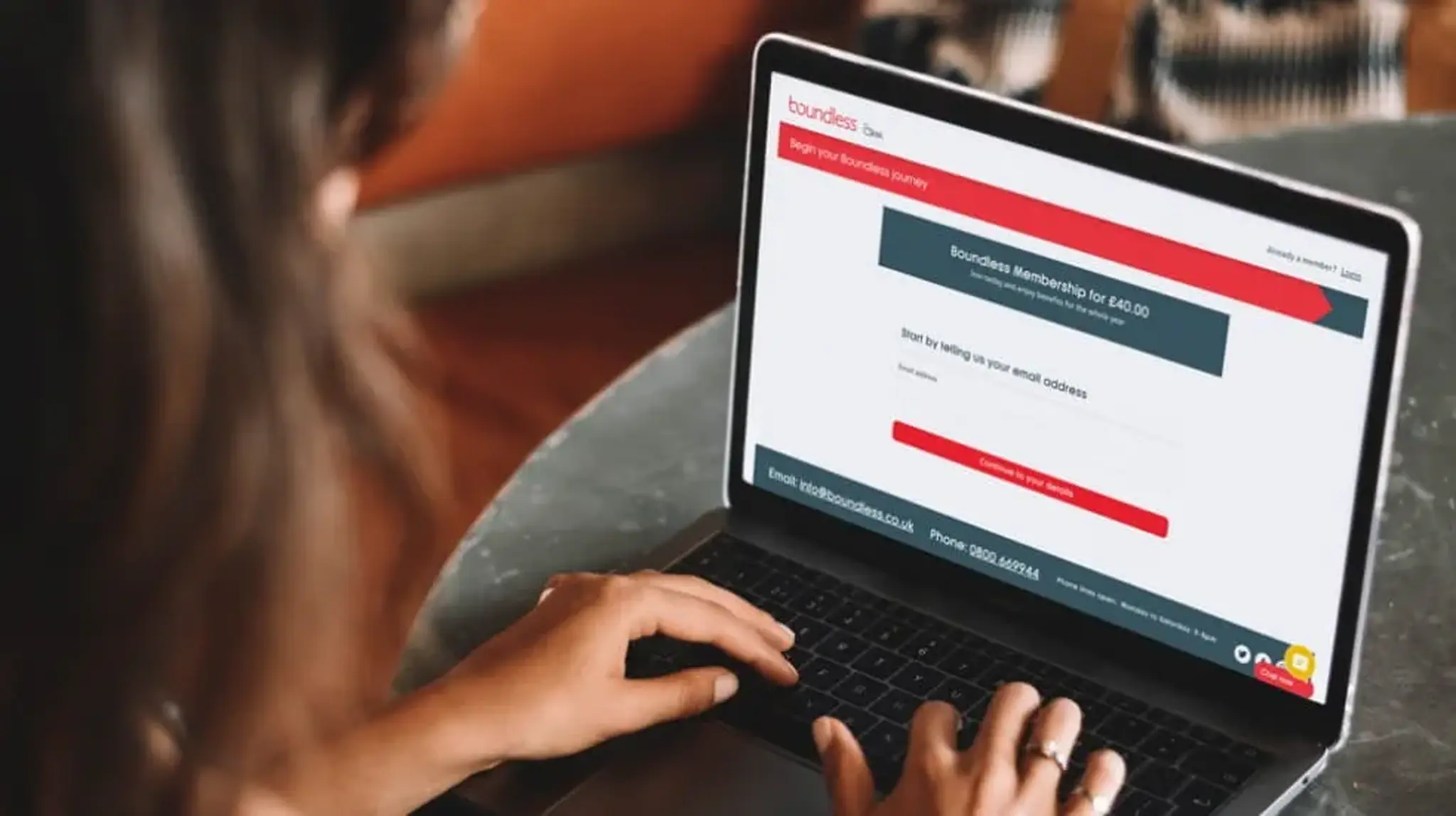 Person using a laptop to sign up for Boundless membership
