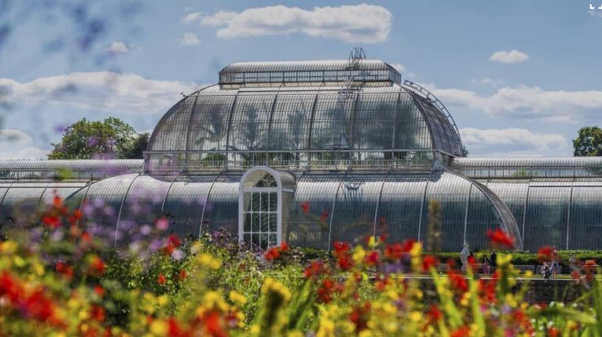 A large glass conservatory with a domed roof