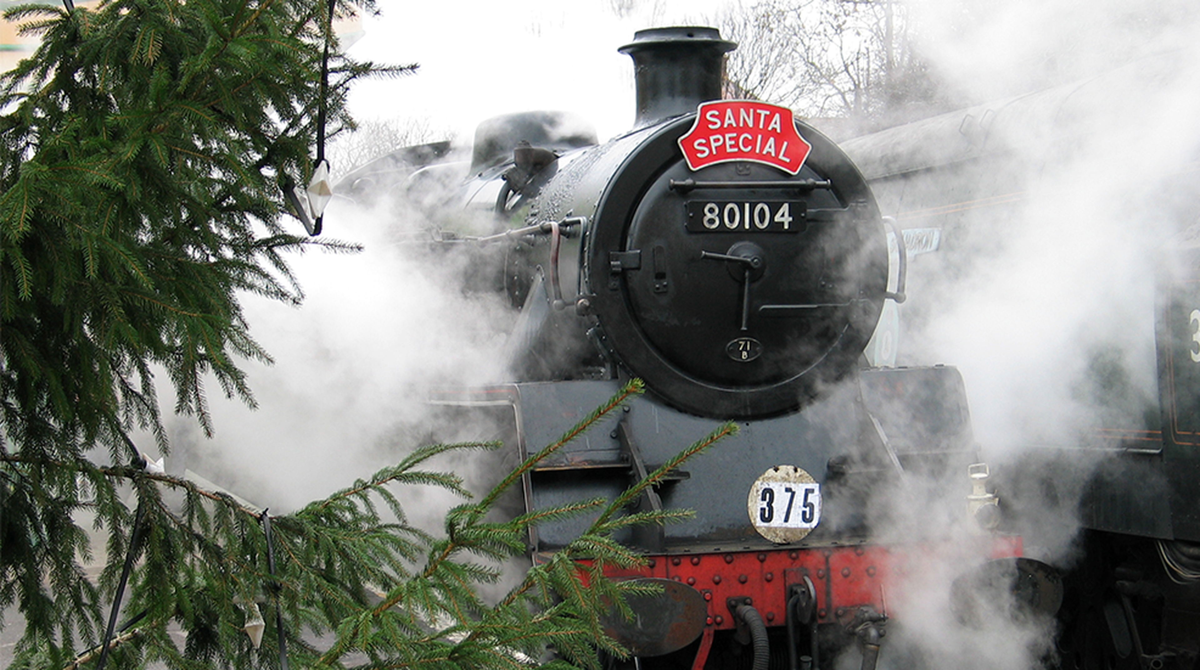A steam locomotive labeled "Santa Special"