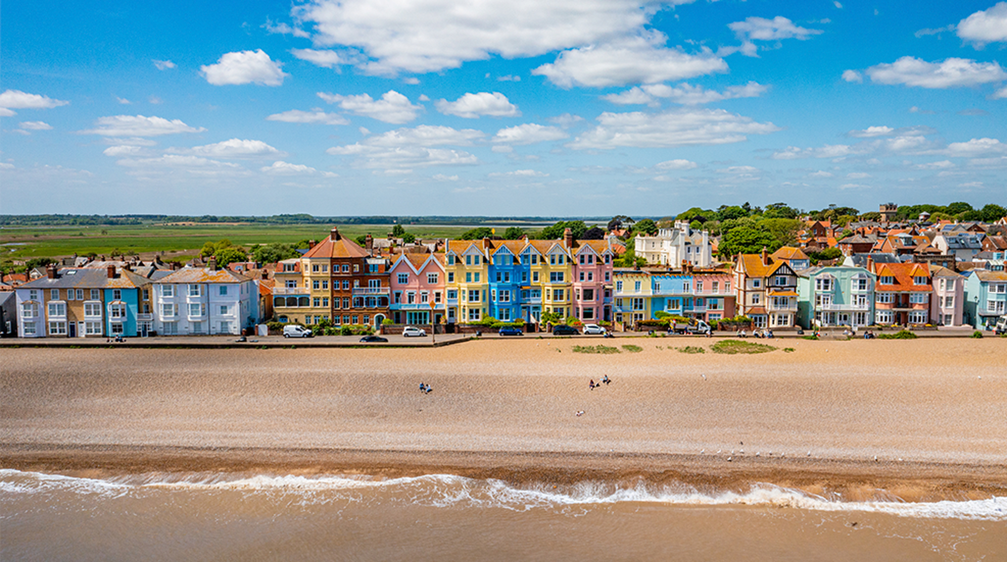 Colourful buildings on sea front at Aldeburgh Beach in Suffolk