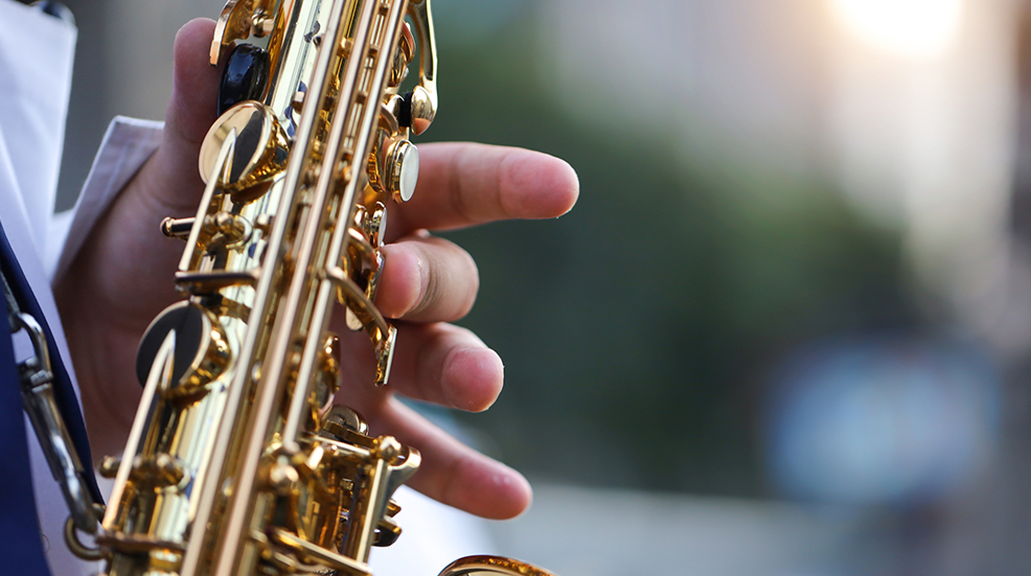 Close up of a hand playing the saxophone
