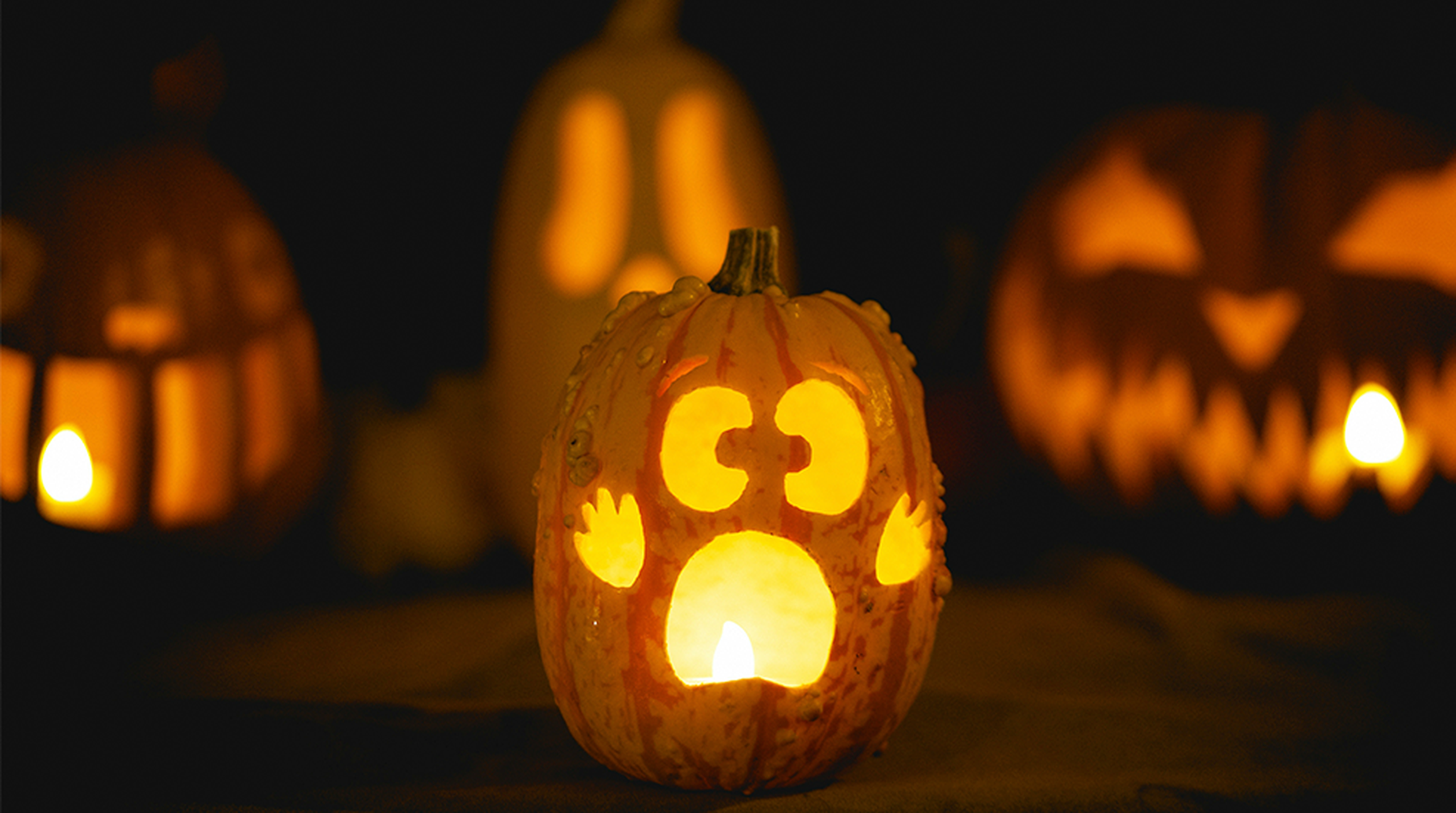 Bumpy pumpkin carves with scared face