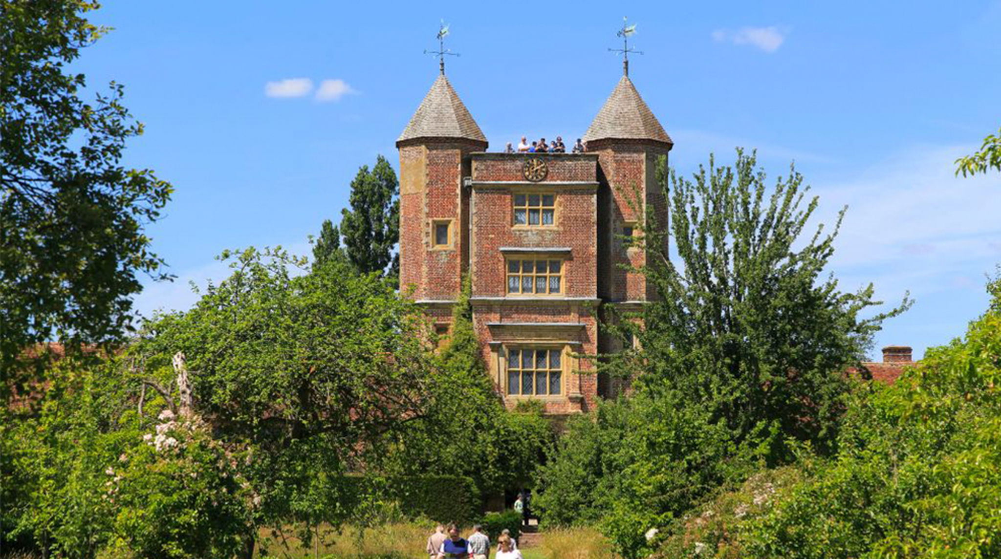 Red brick tower and blue sky Sissinghurst castle gardens, Kent, England