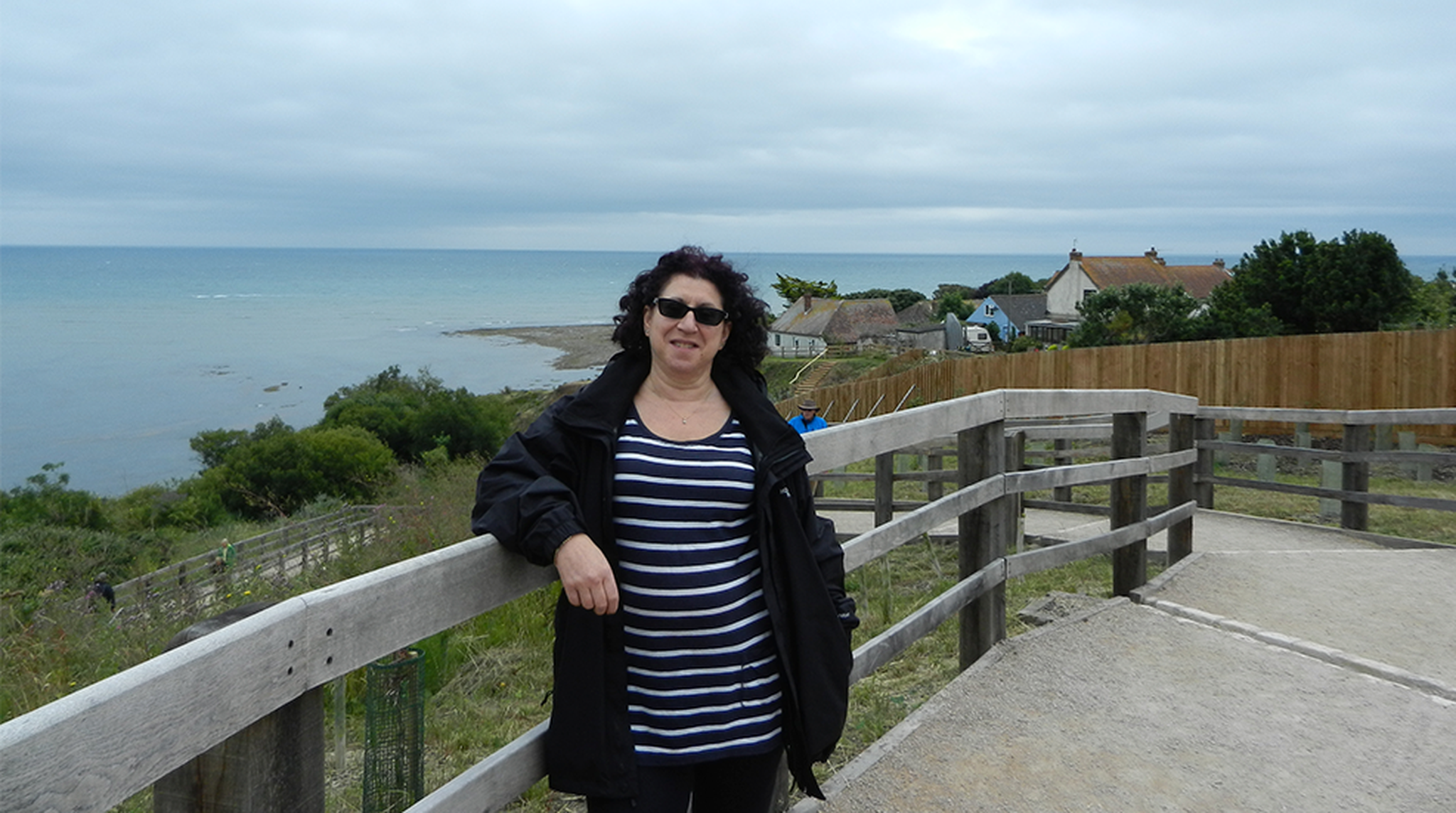 Roz Bott poses by coast
