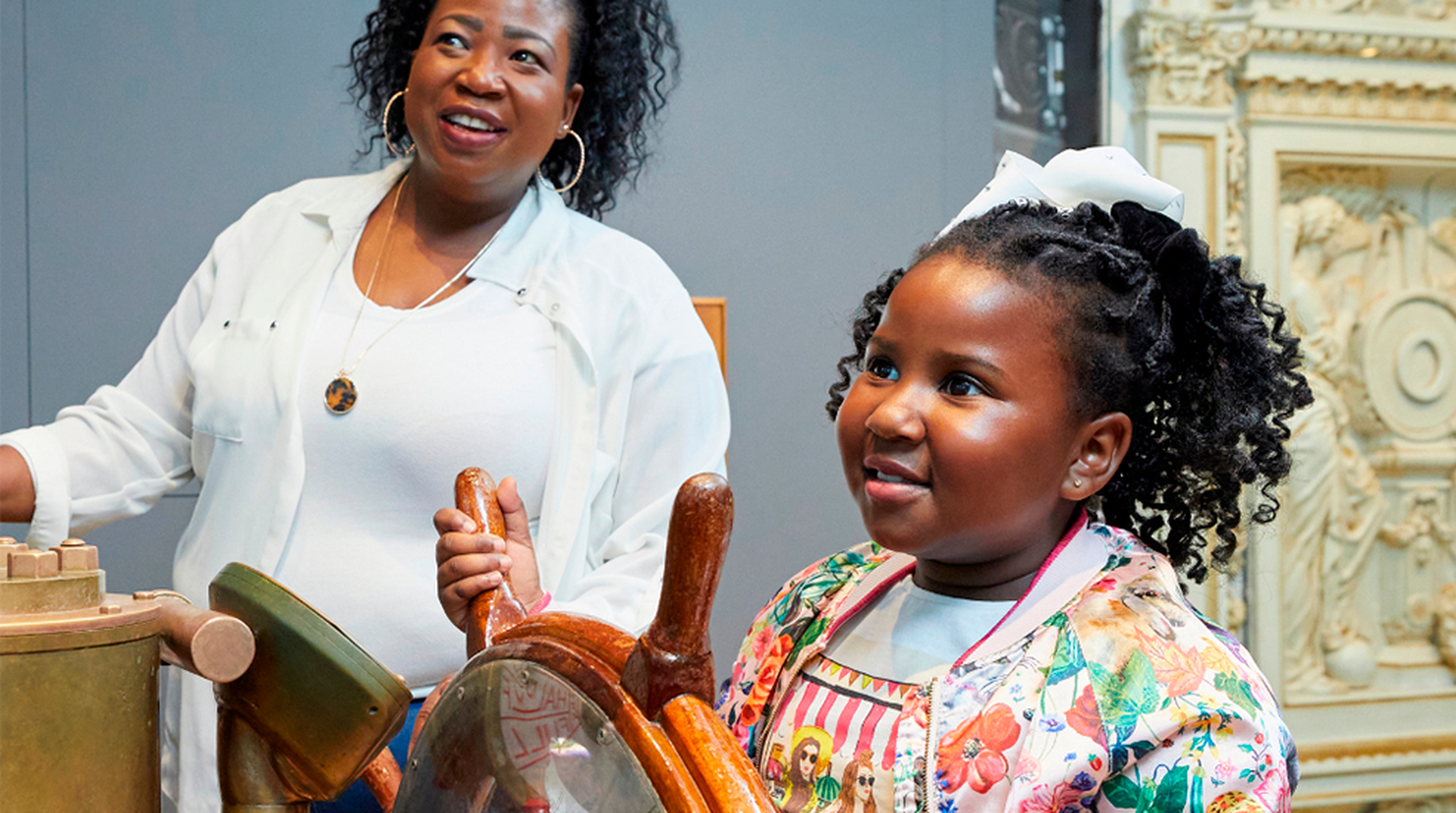 A black mother and her daughter at the SeaCity Museum in Southampton