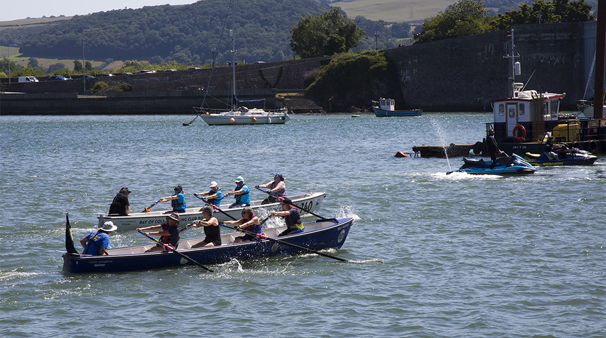 Participants at the Conway River Festival rowing