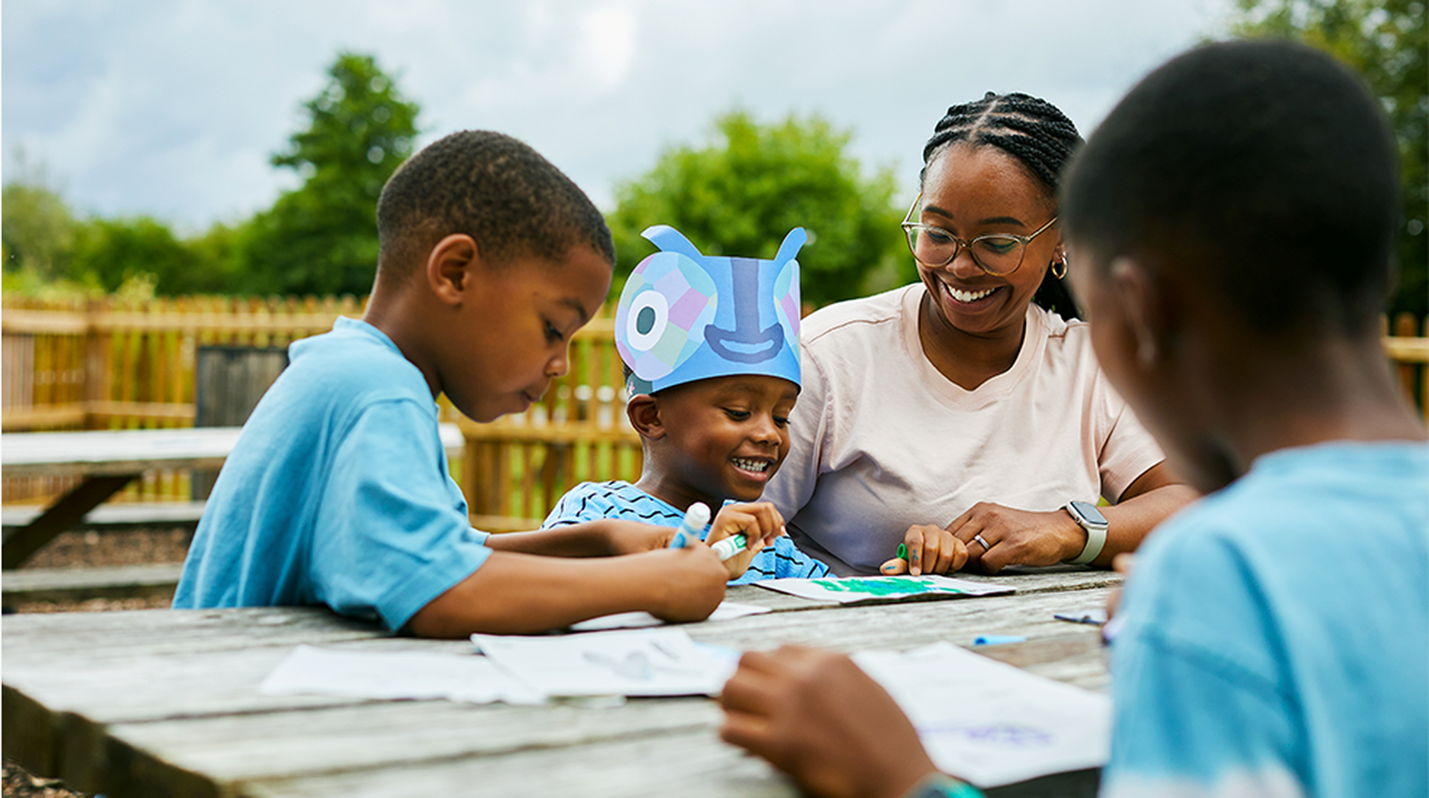 Group of children making crafts for Dragonfly Festival at WWT