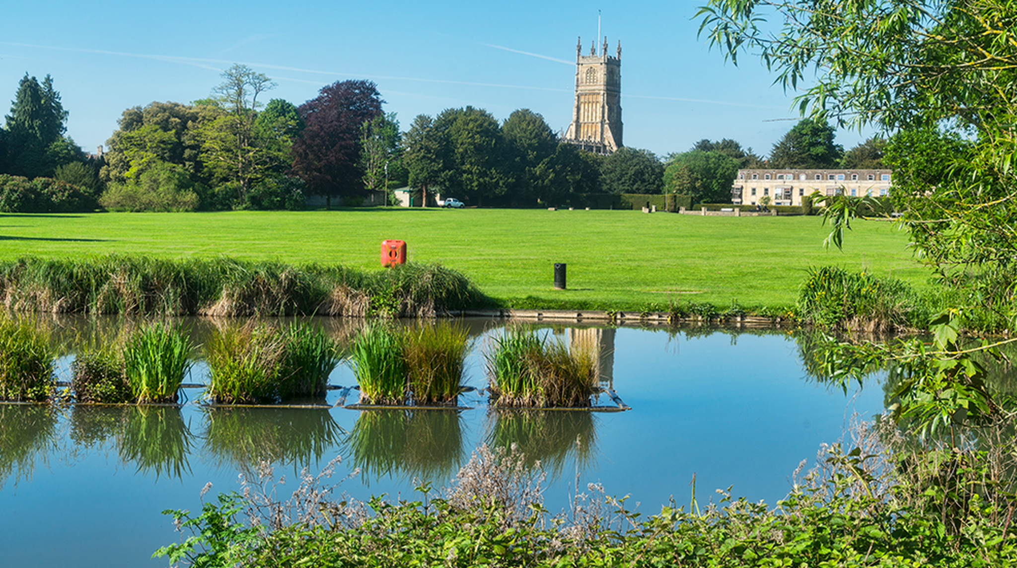 Cirencester Abbey across the green