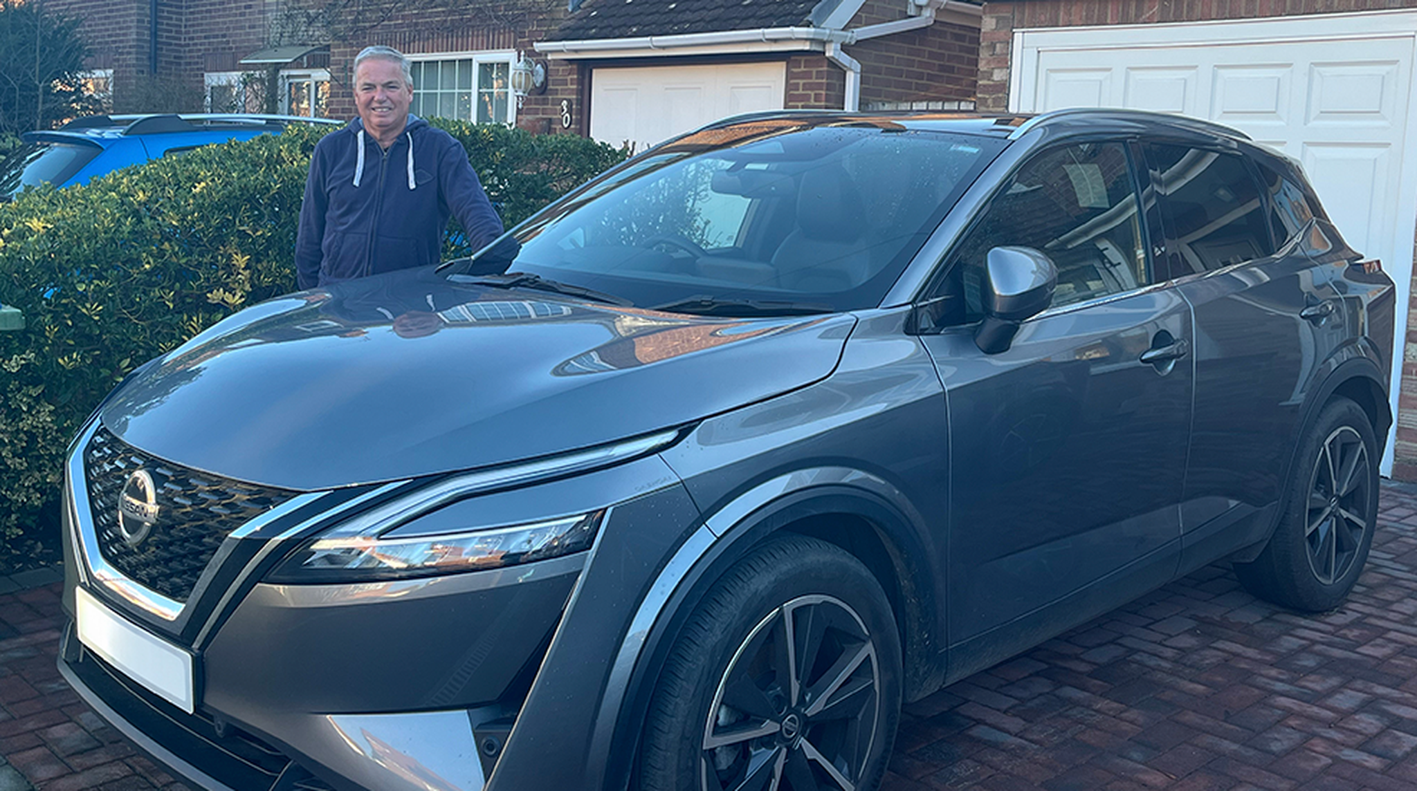 Boundless member Paul Wallace poses alongside new Nissan