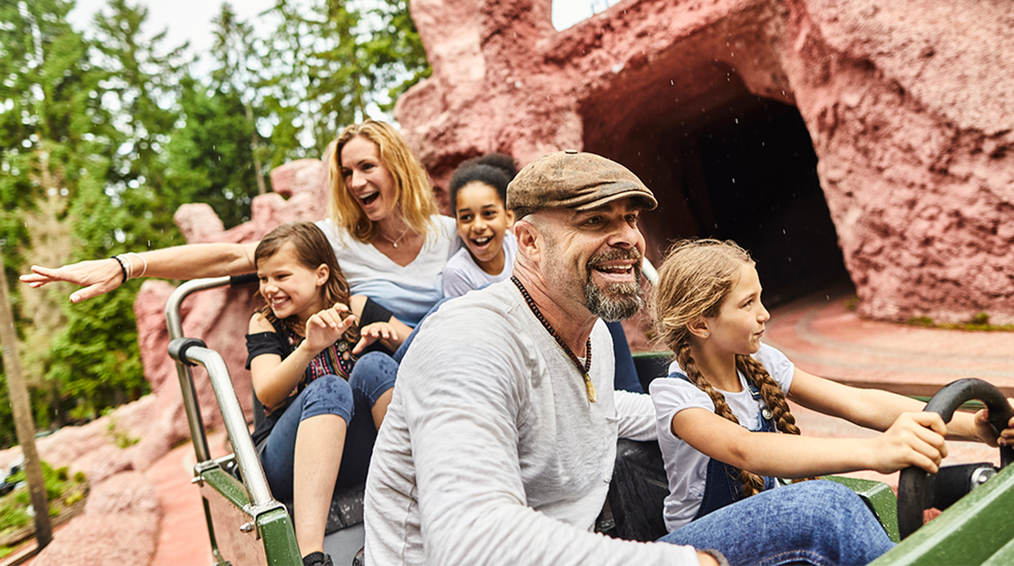 Parents and children on a fairground ride