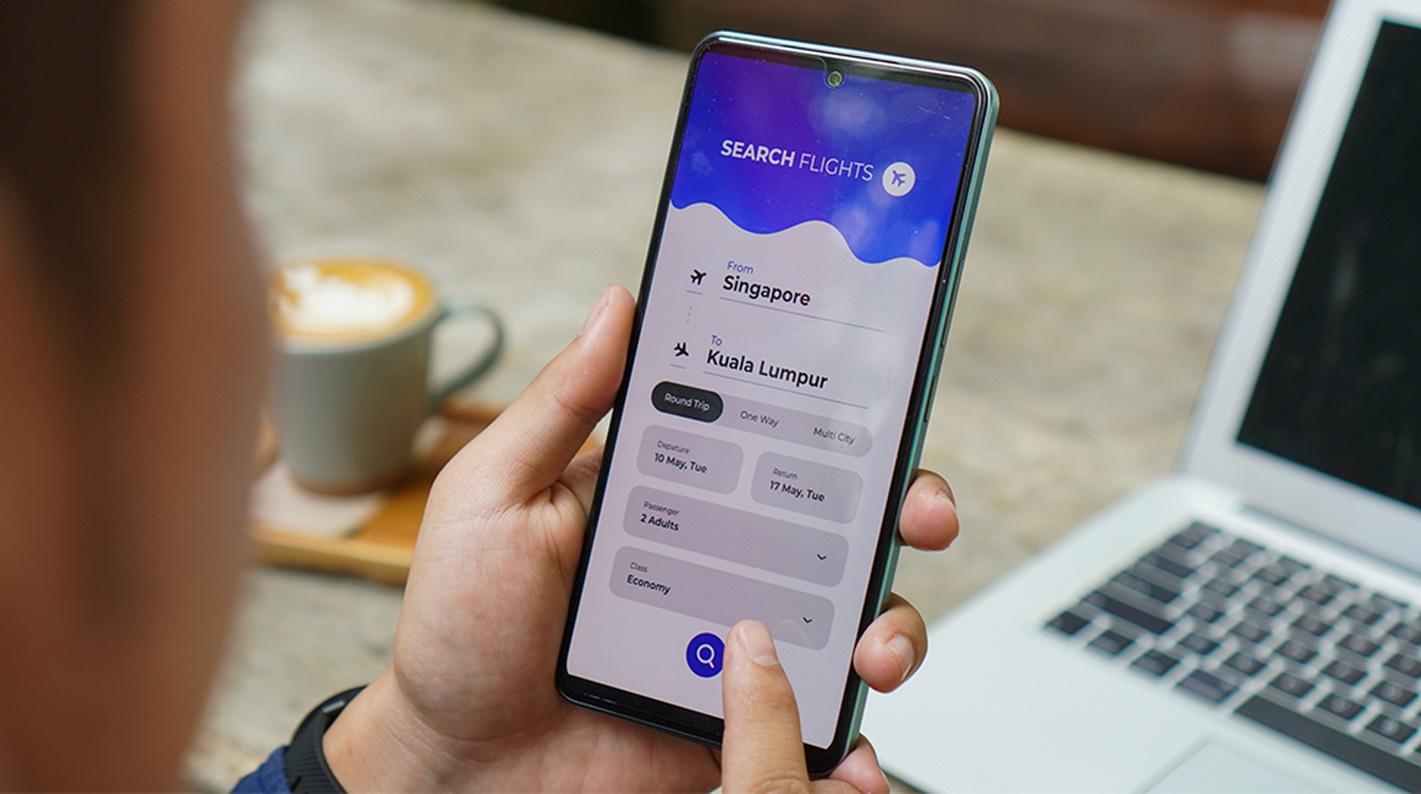 Close up of phone screen booking flights