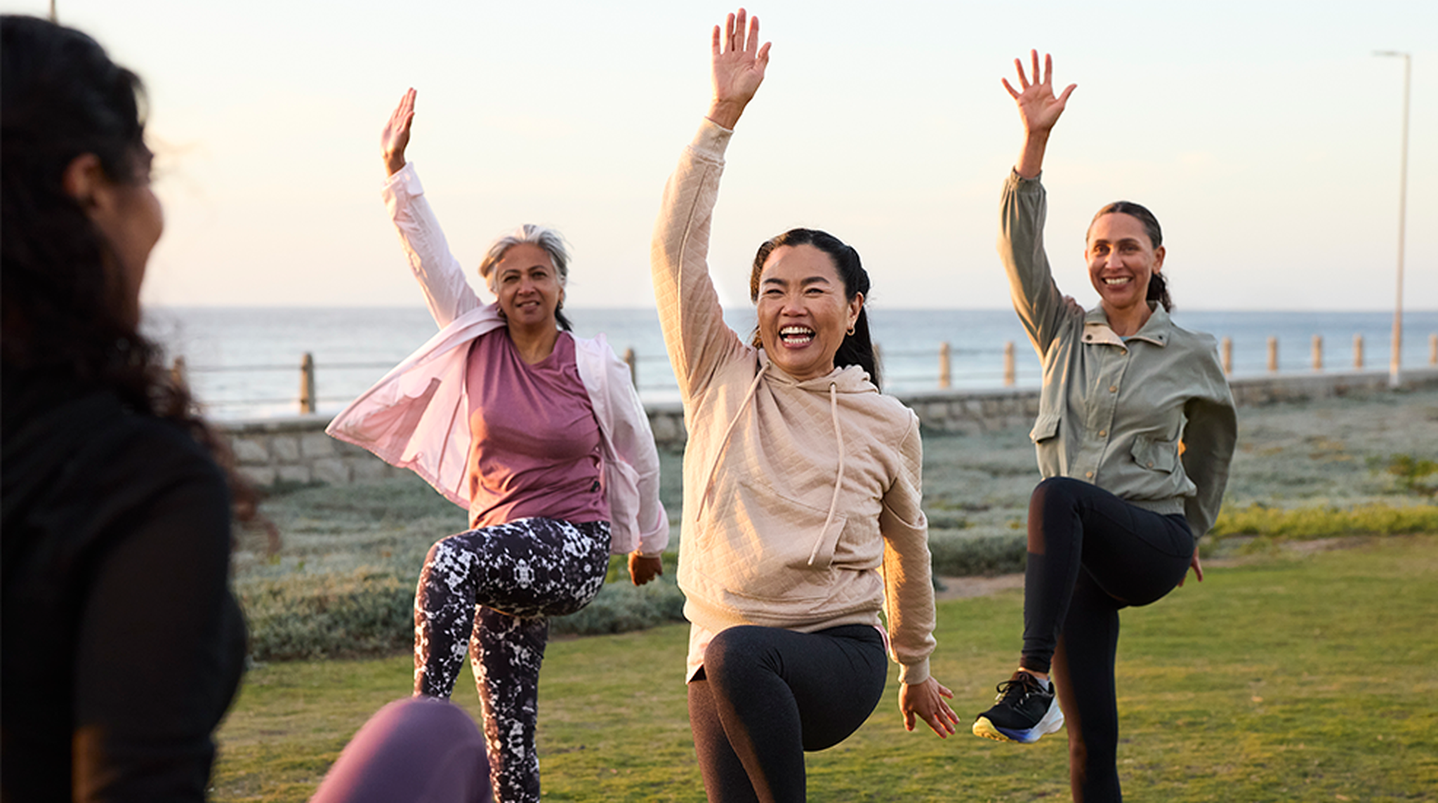 Group of women of different ethnicities doing exercise together