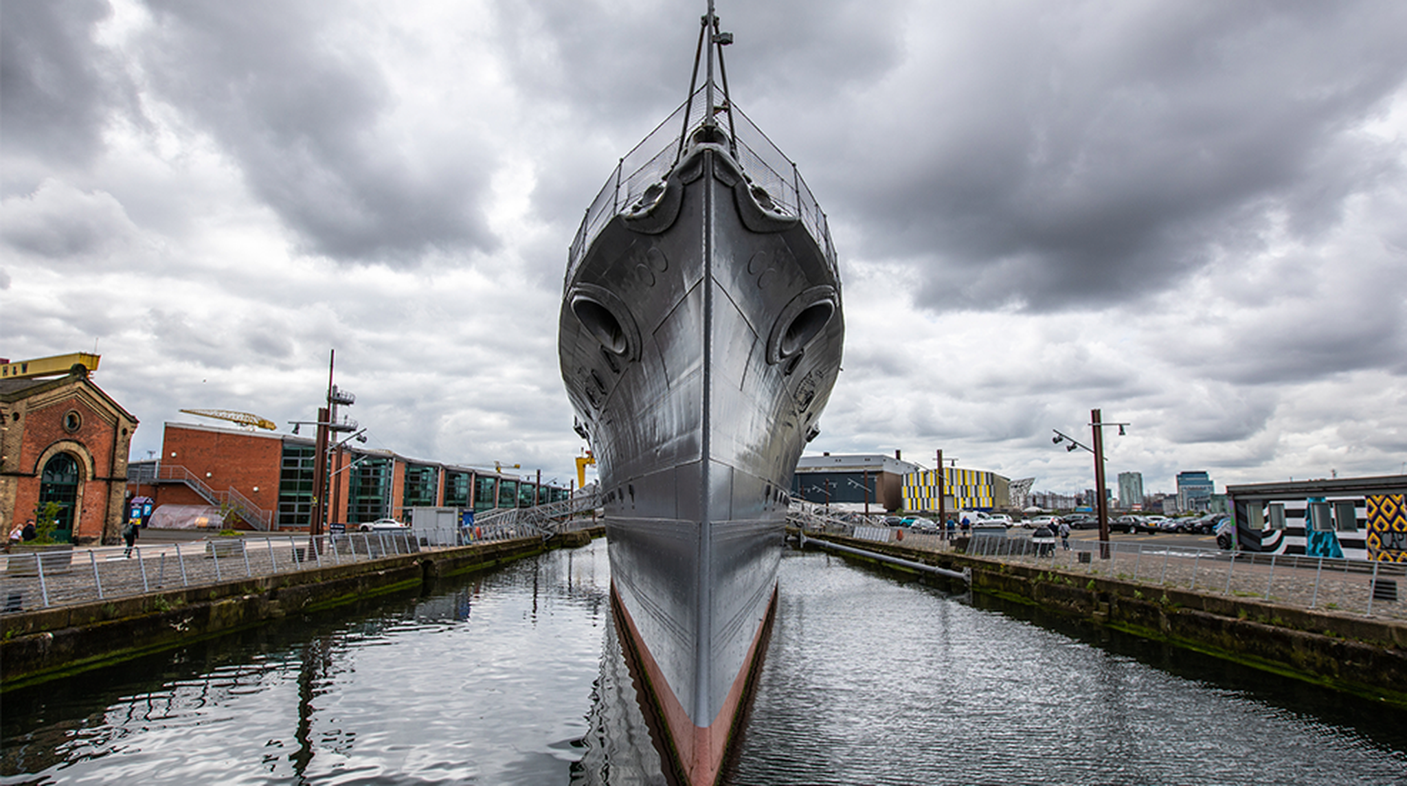 Wide angle view of HMS Caroline, the remarkable First World War ship. HMS Caroline is located at Alexandra Dock, Queens Rd, Belfast in the heart of Titanic Quarter.