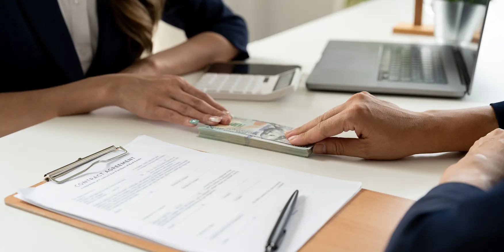 business-partners-signing-contract-to-borrow-money