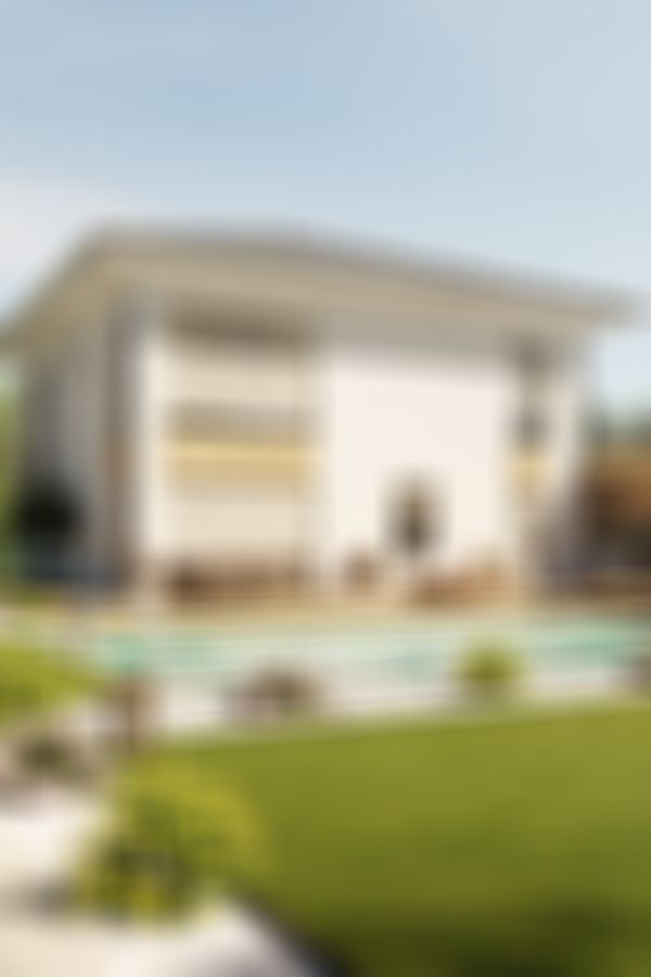 Das Bild zeigt eine Stadtvilla mit Pool.