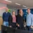 Teamfoto van Unica Innovation Center op kantoor. Vier teamleden staan lachend naast elkaar.