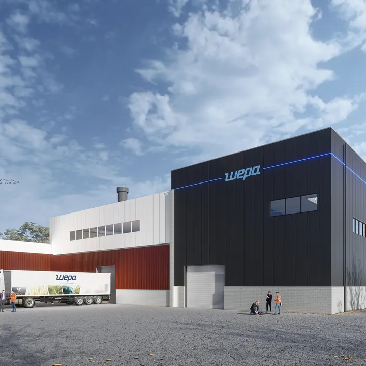 Het WEPA gebouw met op de voorgrond een vrachtwagen van WEPA en meerdere mensen.
