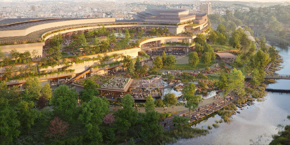 Futuristic, eco-friendly building complex surrounded by lush greenery, pathways, and a river, integrating nature with modern architecture.
