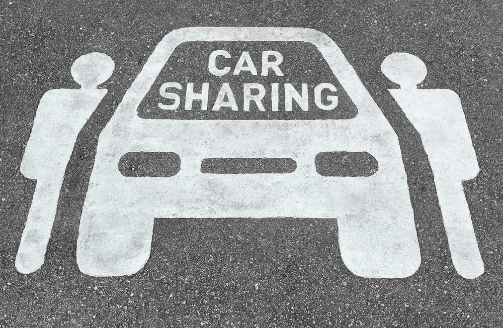 qué es carsharing símbolo en el suelo