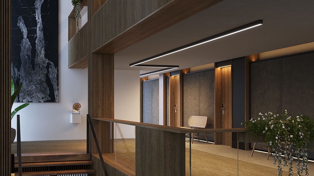 Hotel corridor with Simon 860 black luminaires integrated in wooden ceiling