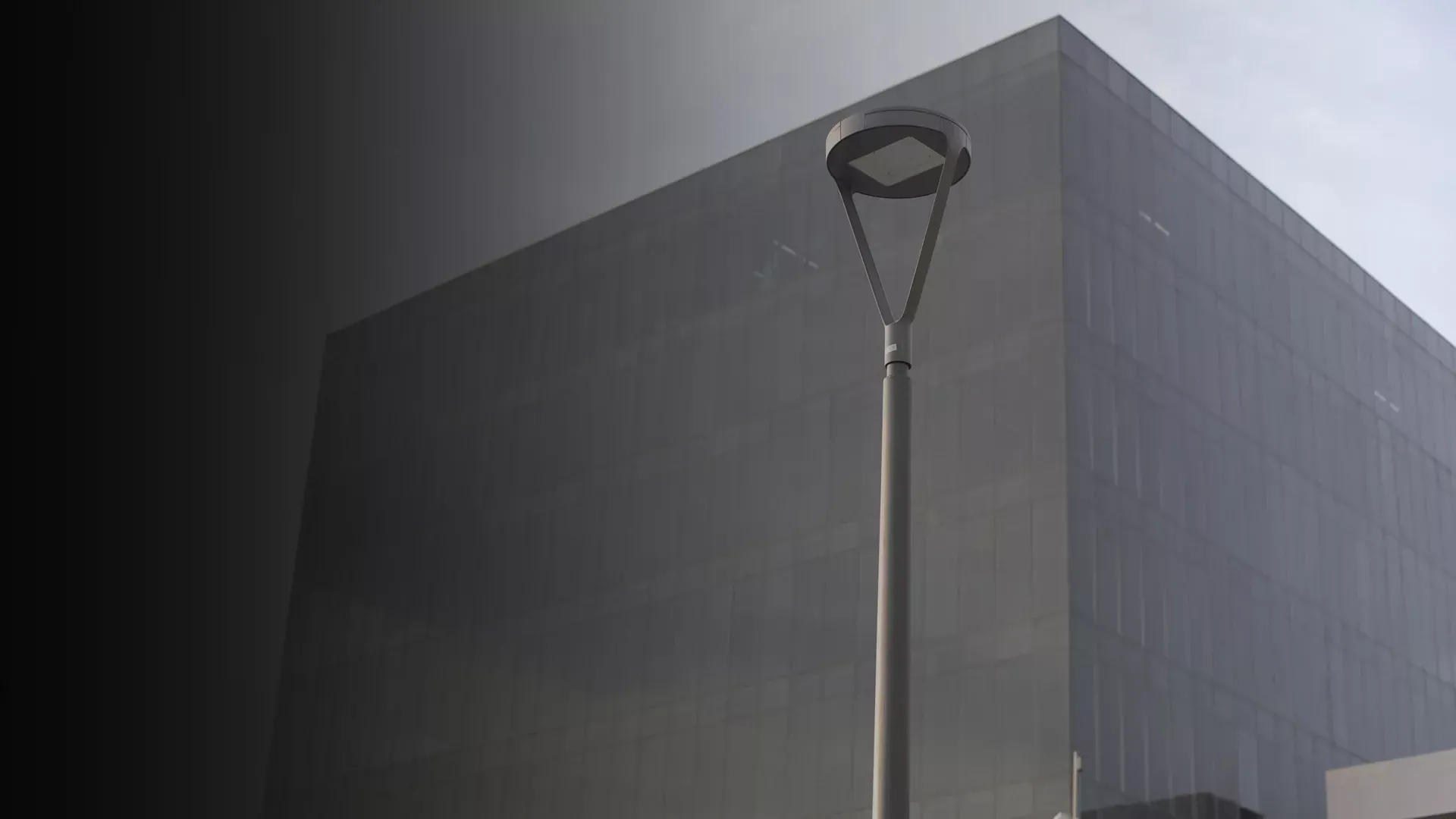 Simon Merak SYF Istanium LED luminaire — decorative urban lighting with Y-shaped post-top fastening