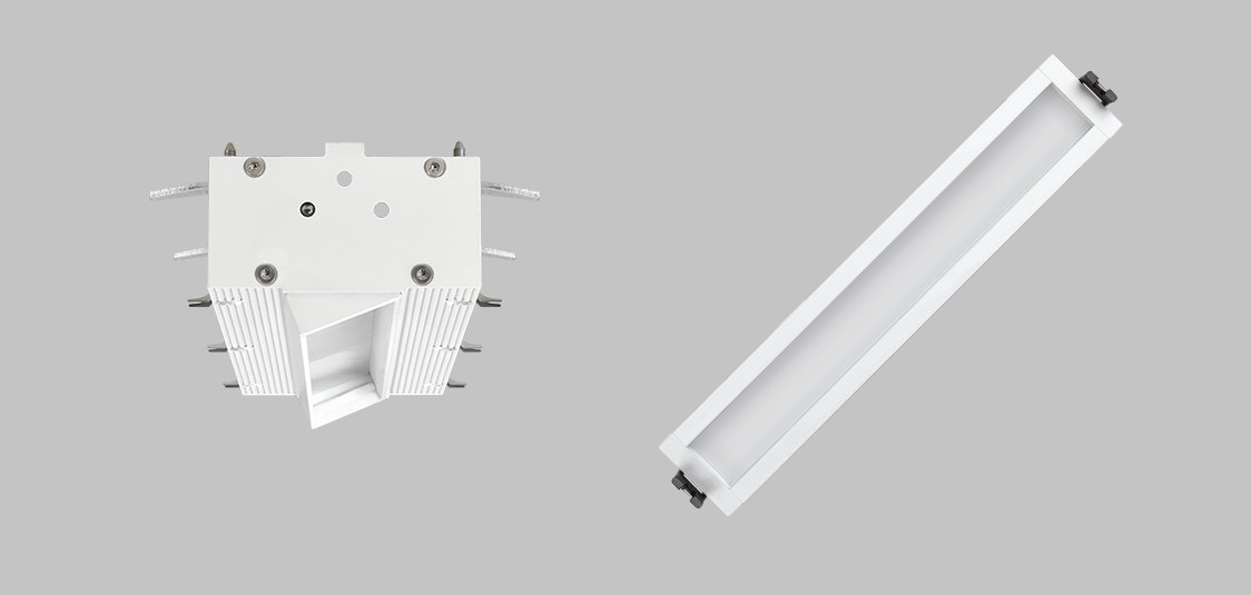 Two views of Simon 712 downlight: trimless body disassembled and assembled linear luminaire